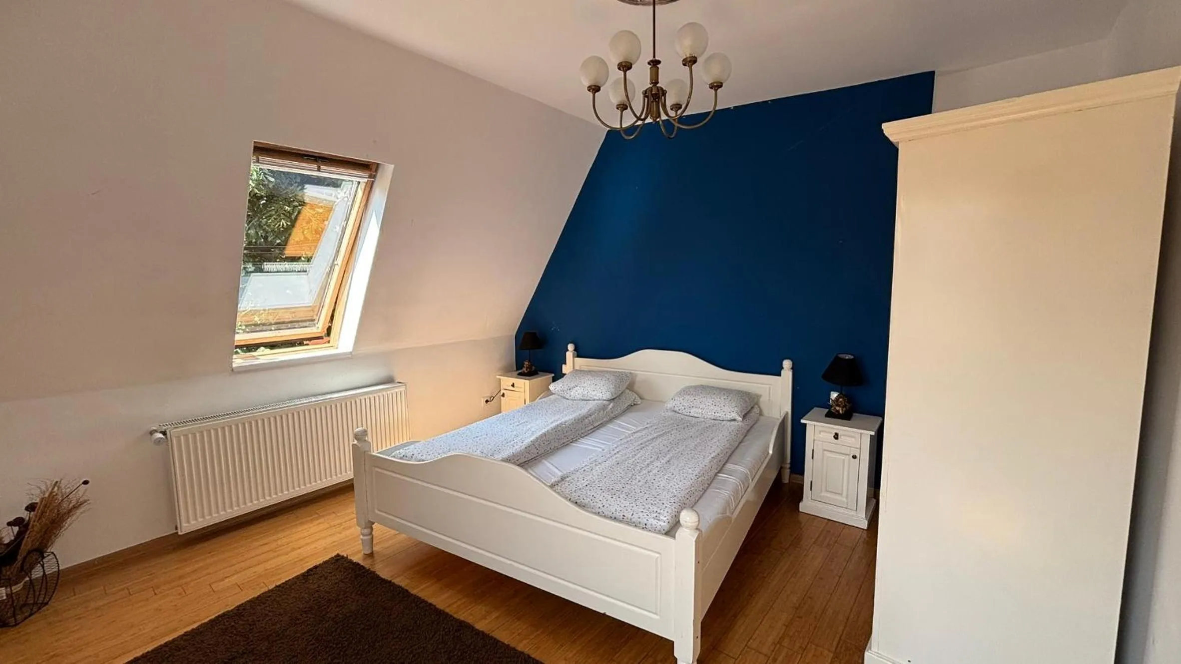 Bed in Pannónia Rooms and Apartments