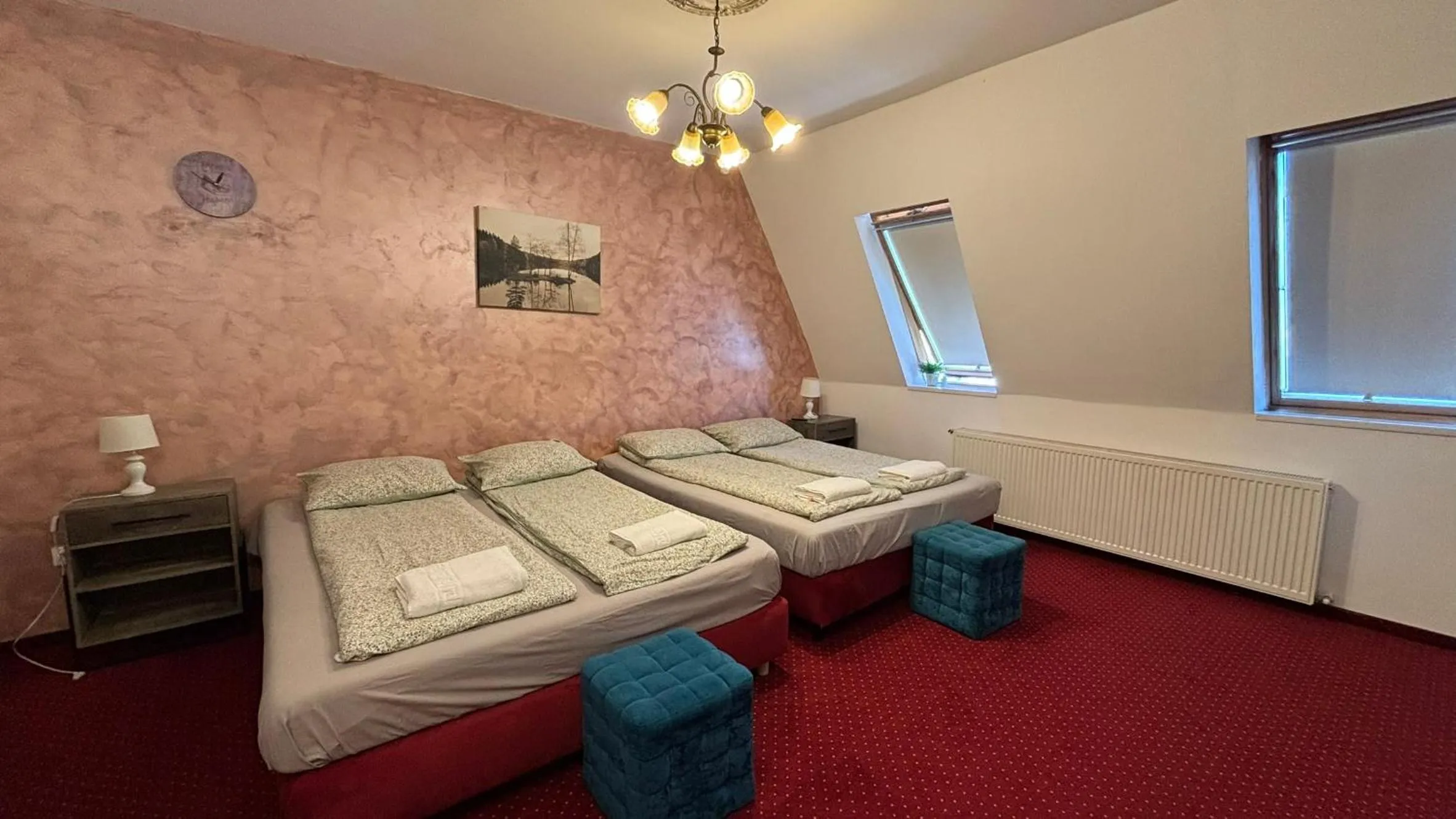 Bed in Pannónia Rooms and Apartments