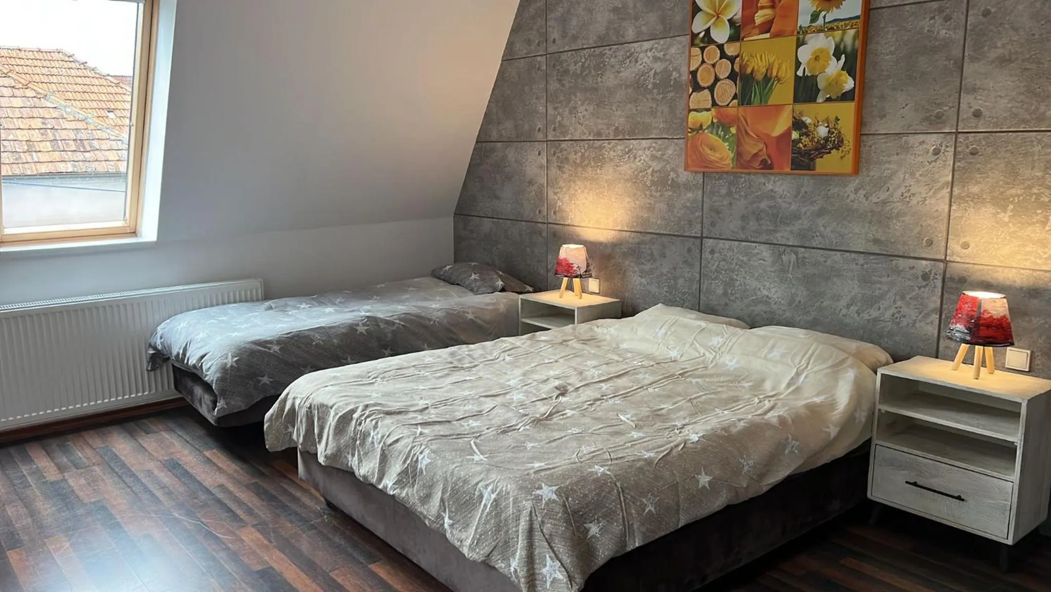 Bed in Pannónia Rooms and Apartments