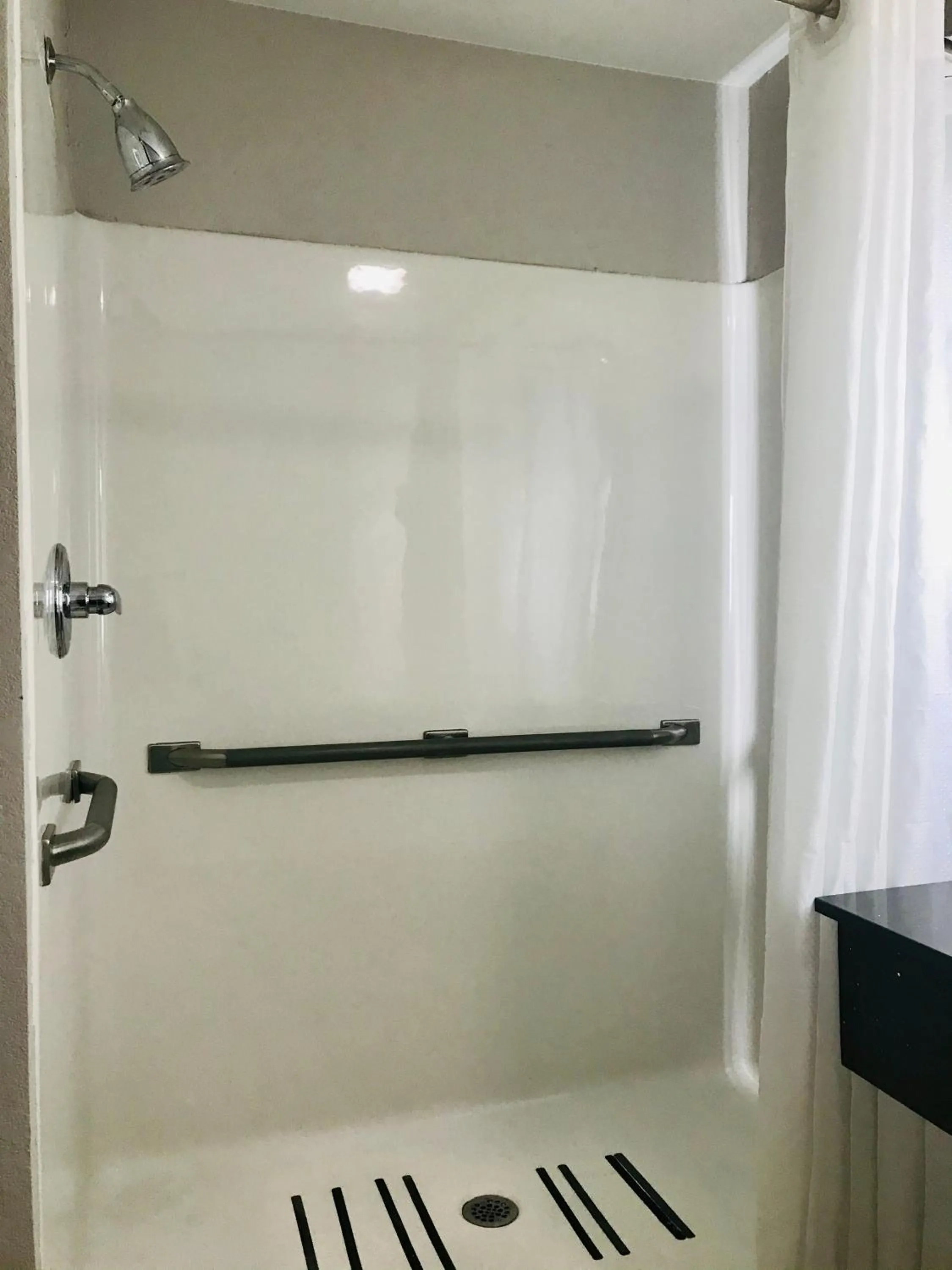Shower in Country Inn & Suites by Radisson, Warner Robins, GA