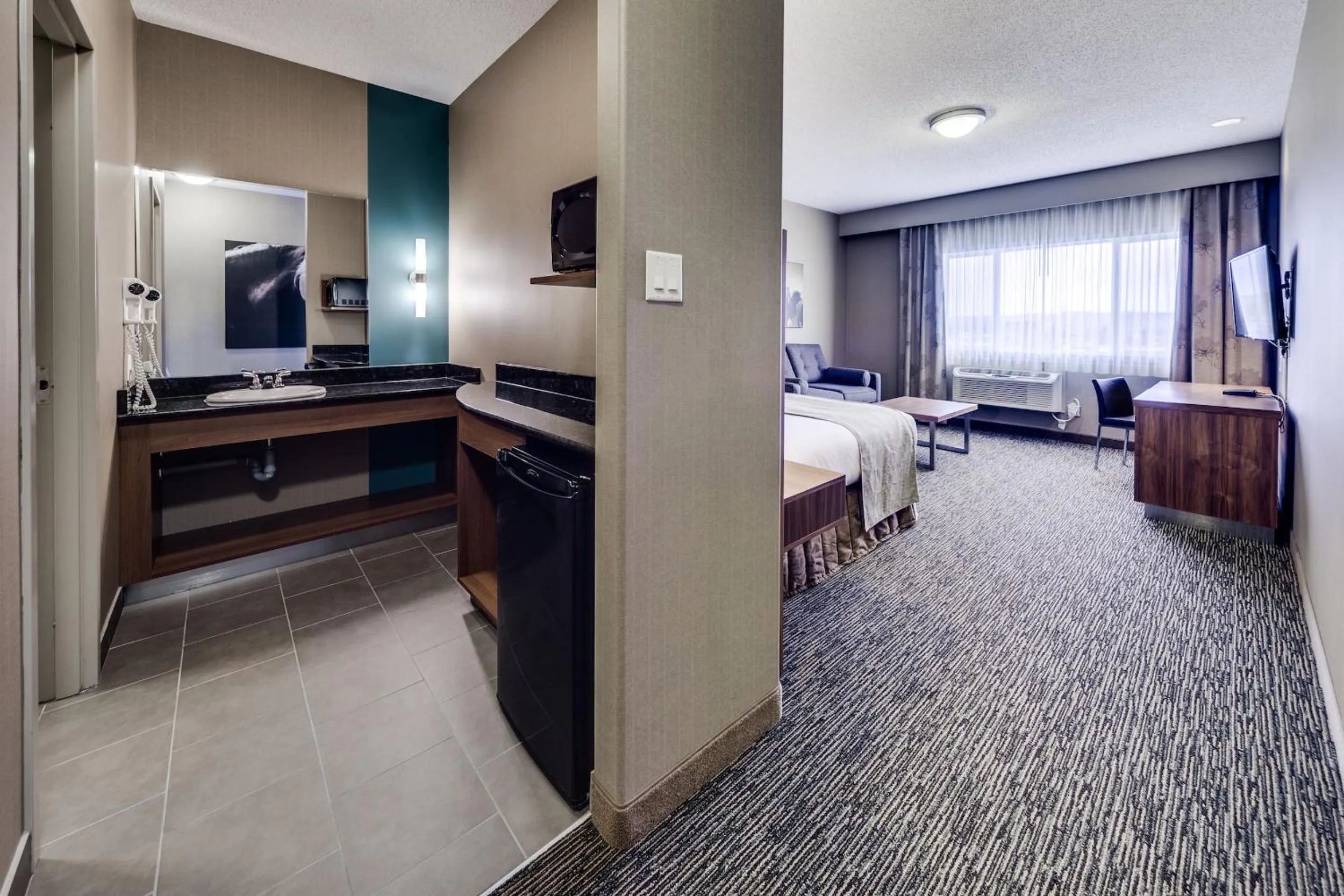 Bed in Heritage Inn Hotel & Convention Centre - Pincher Creek