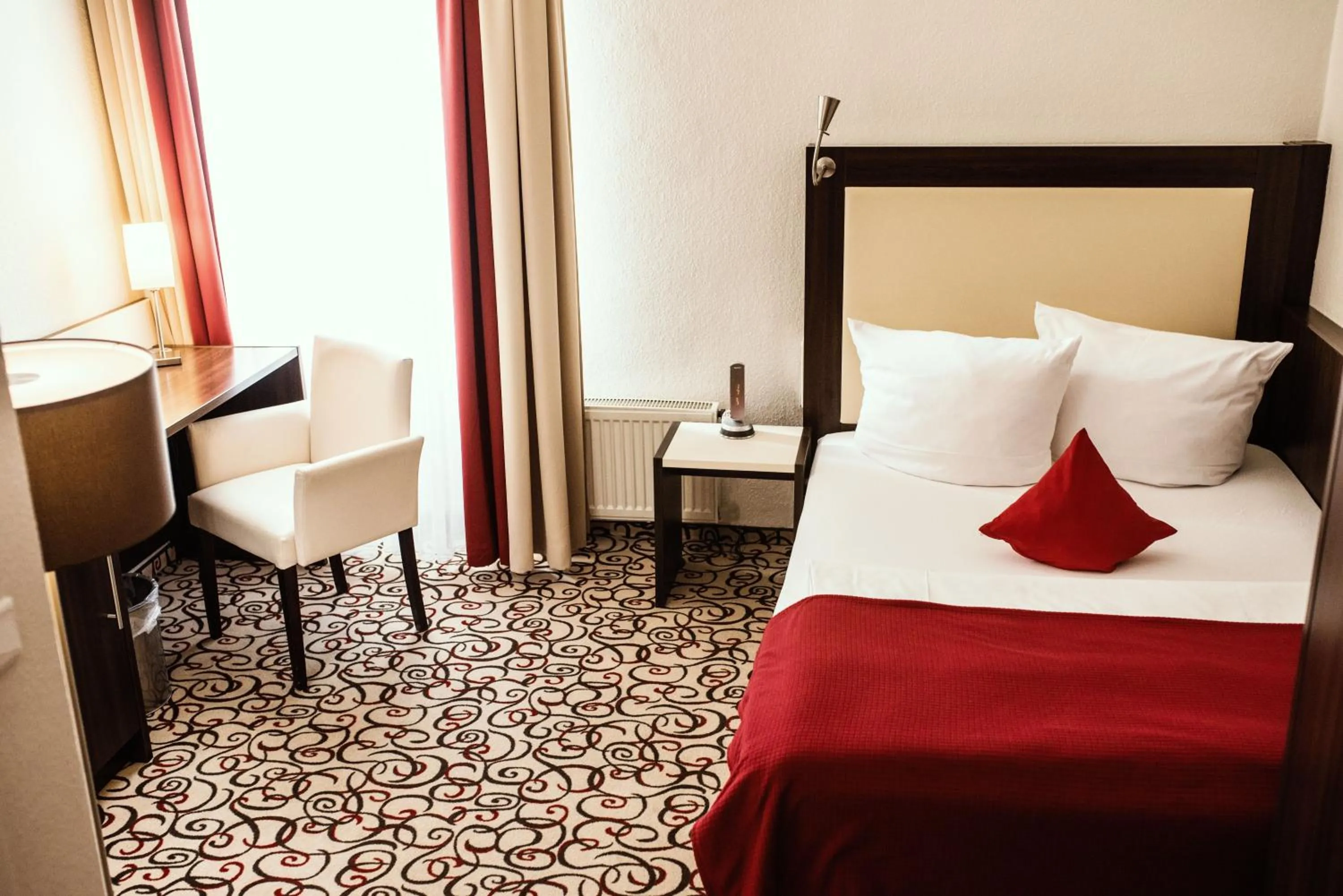 Bed in Heerens Hotel