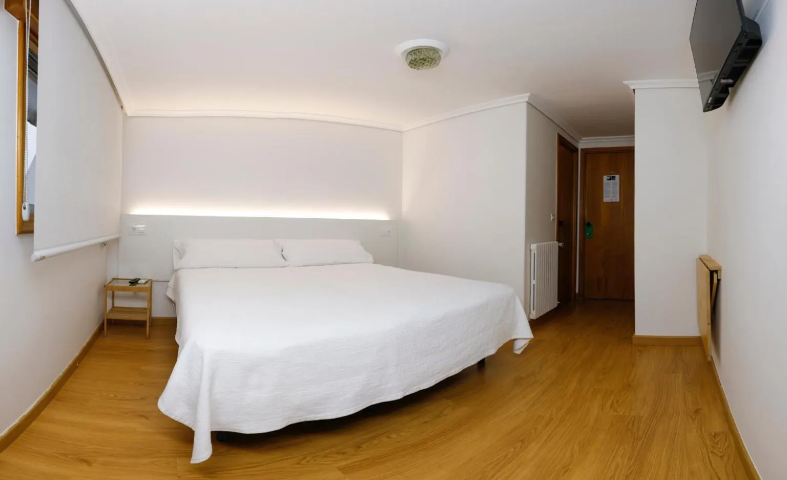 Bed in Pensión Venus