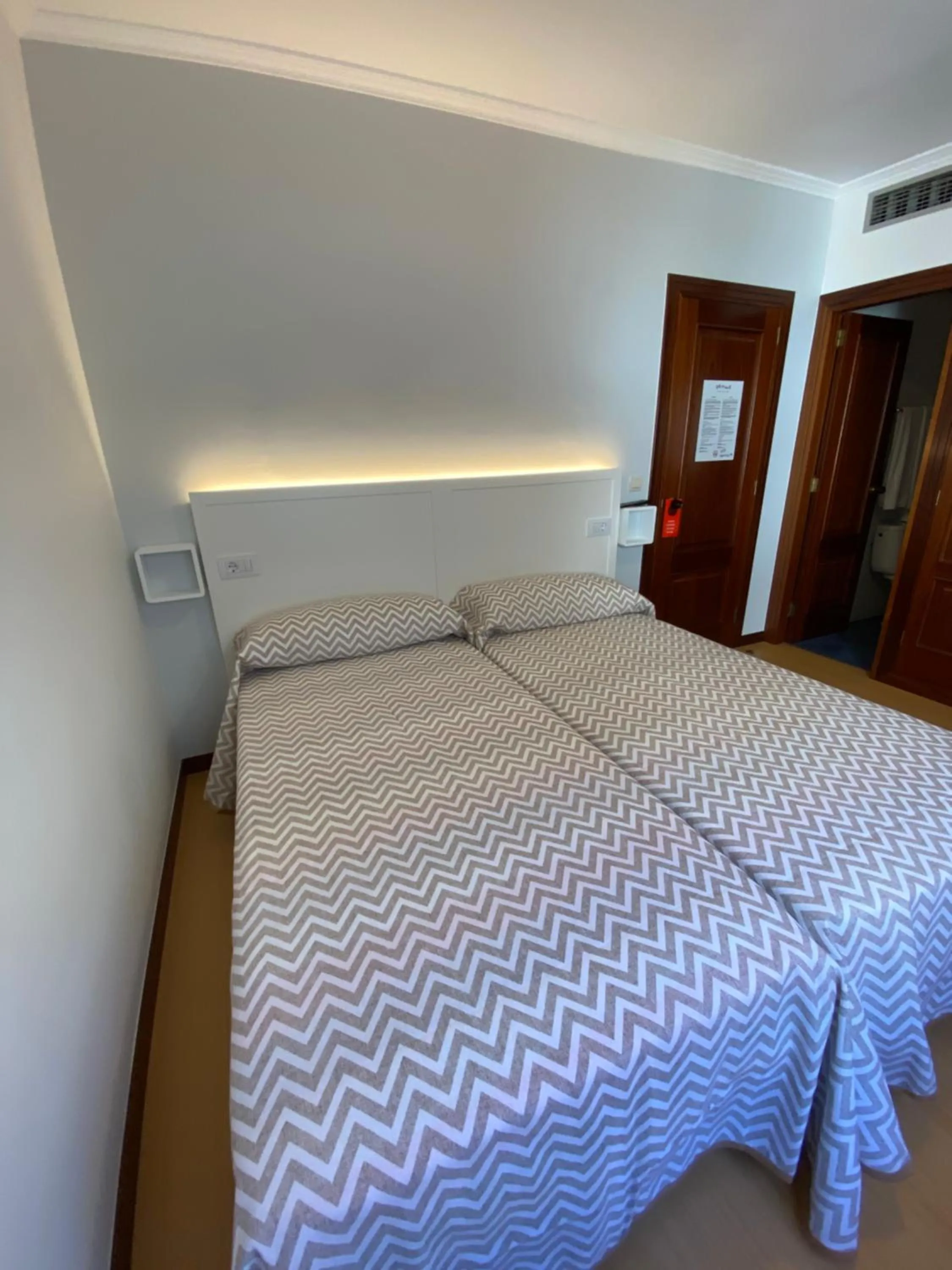 Bed in Pensión Venus