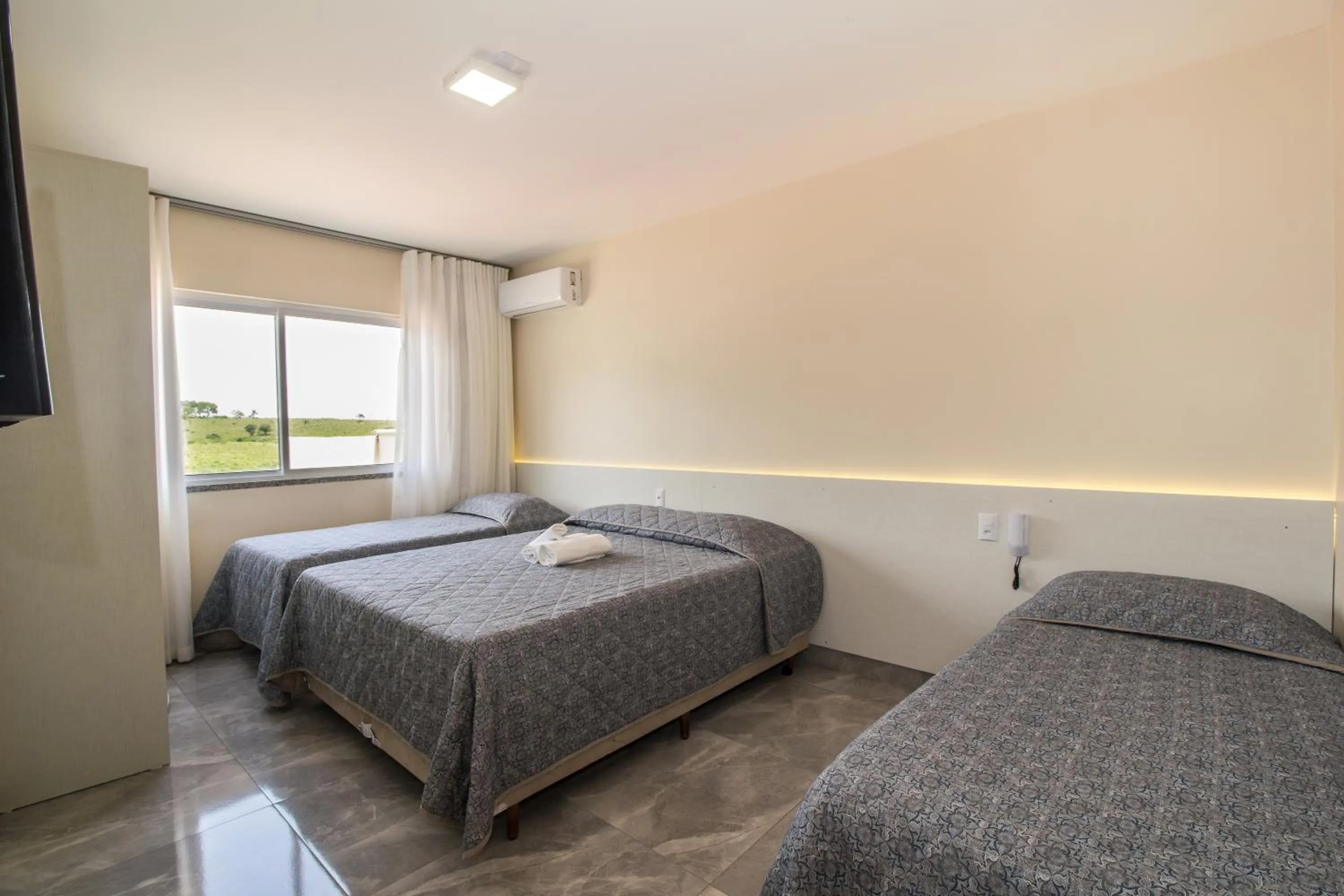 Bed in Pousada Espindola