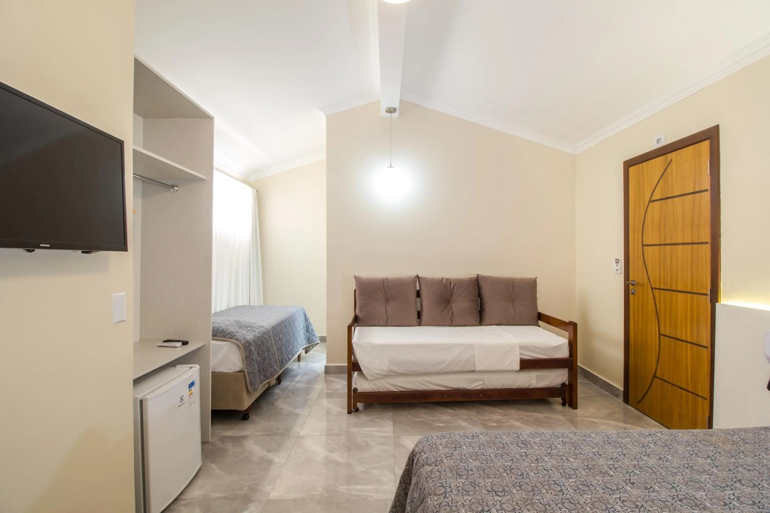 Photo of the whole room, Bed in Pousada Espindola