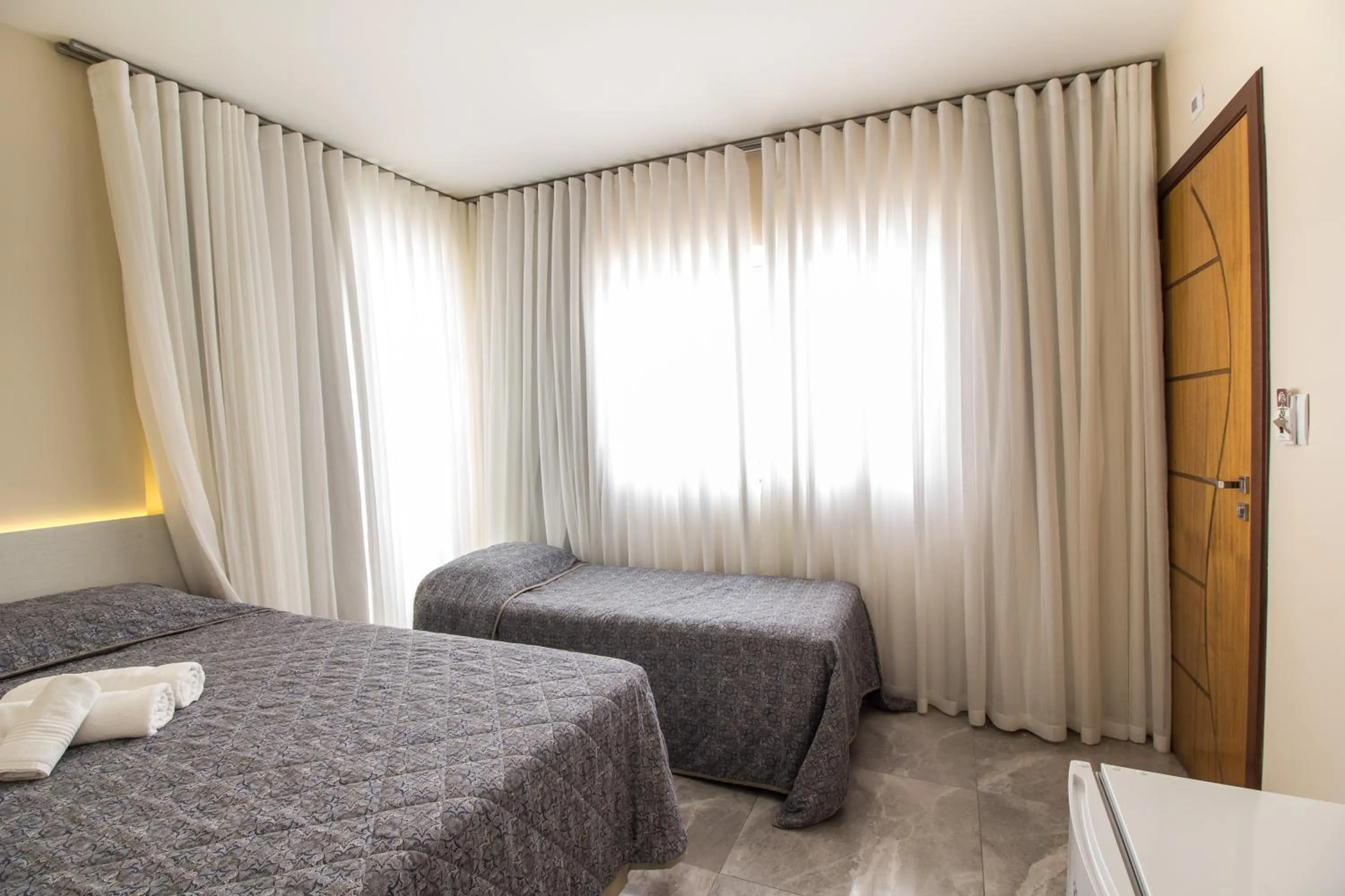 Bed in Pousada Espindola