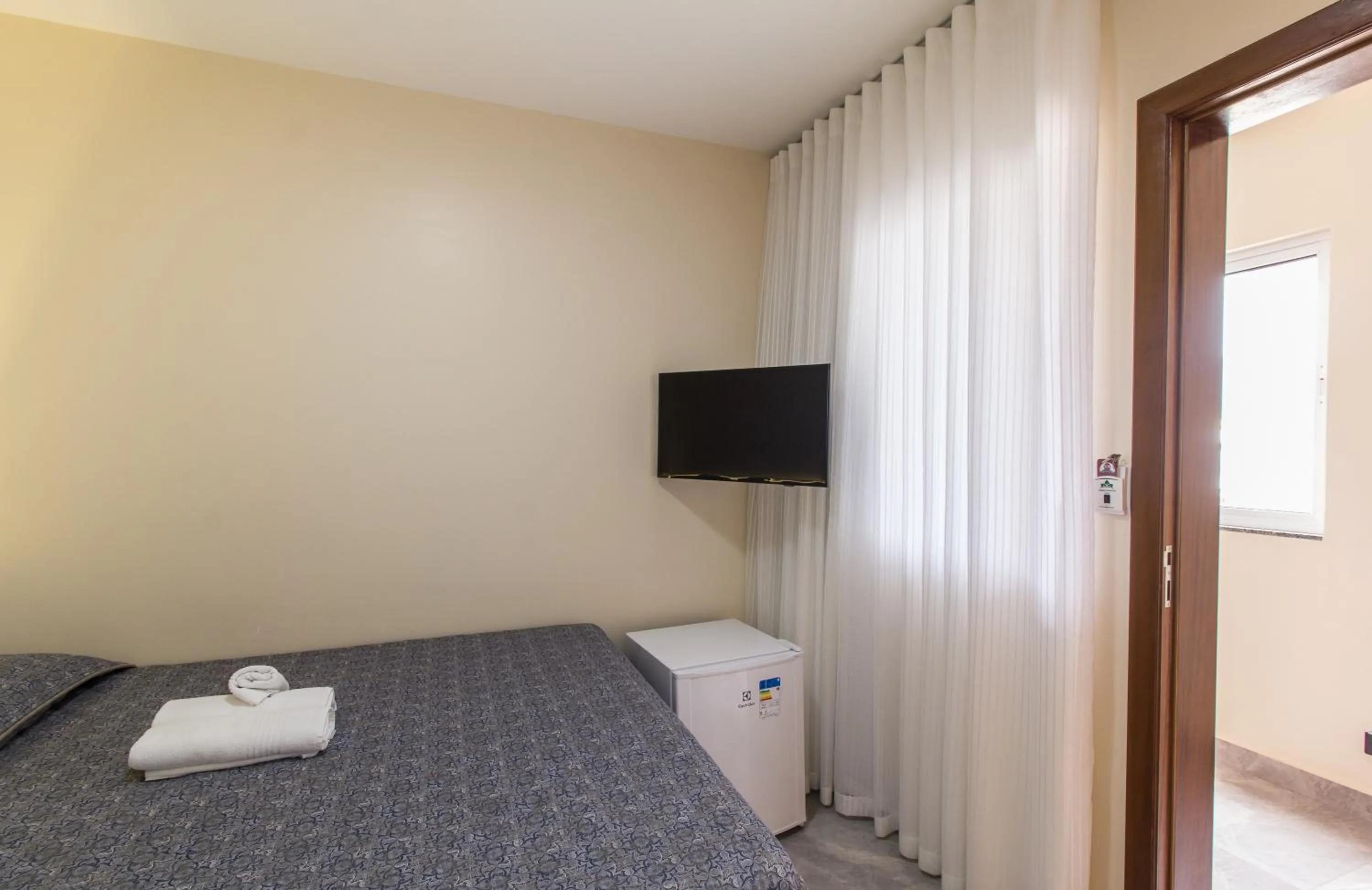 Bed in Pousada Espindola