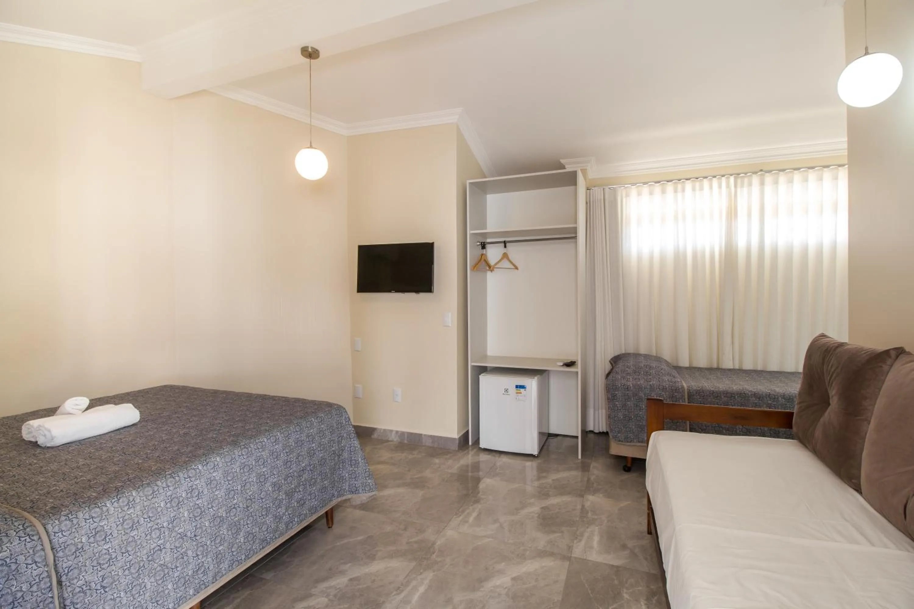 Bed in Pousada Espindola