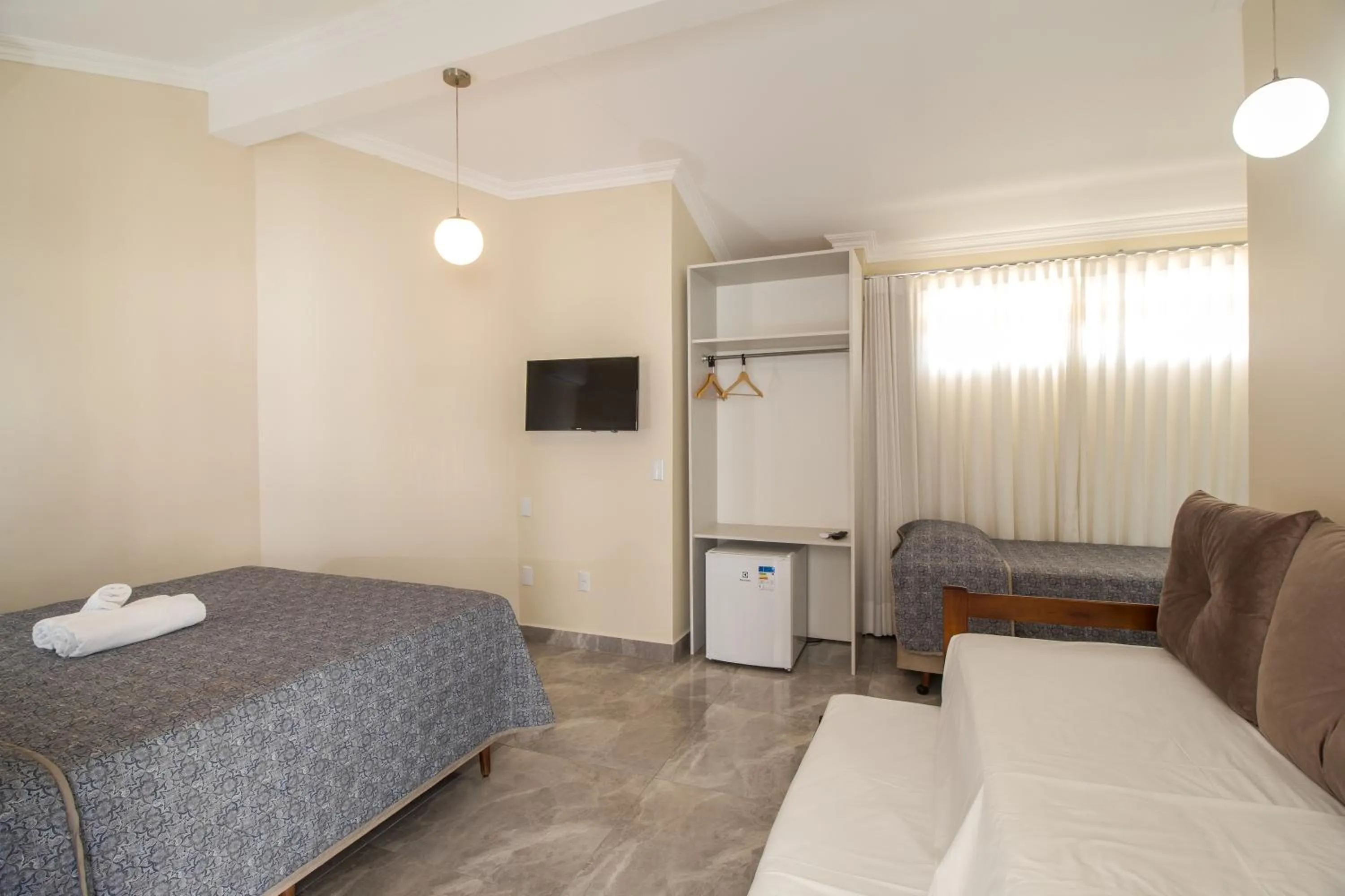 Bed in Pousada Espindola