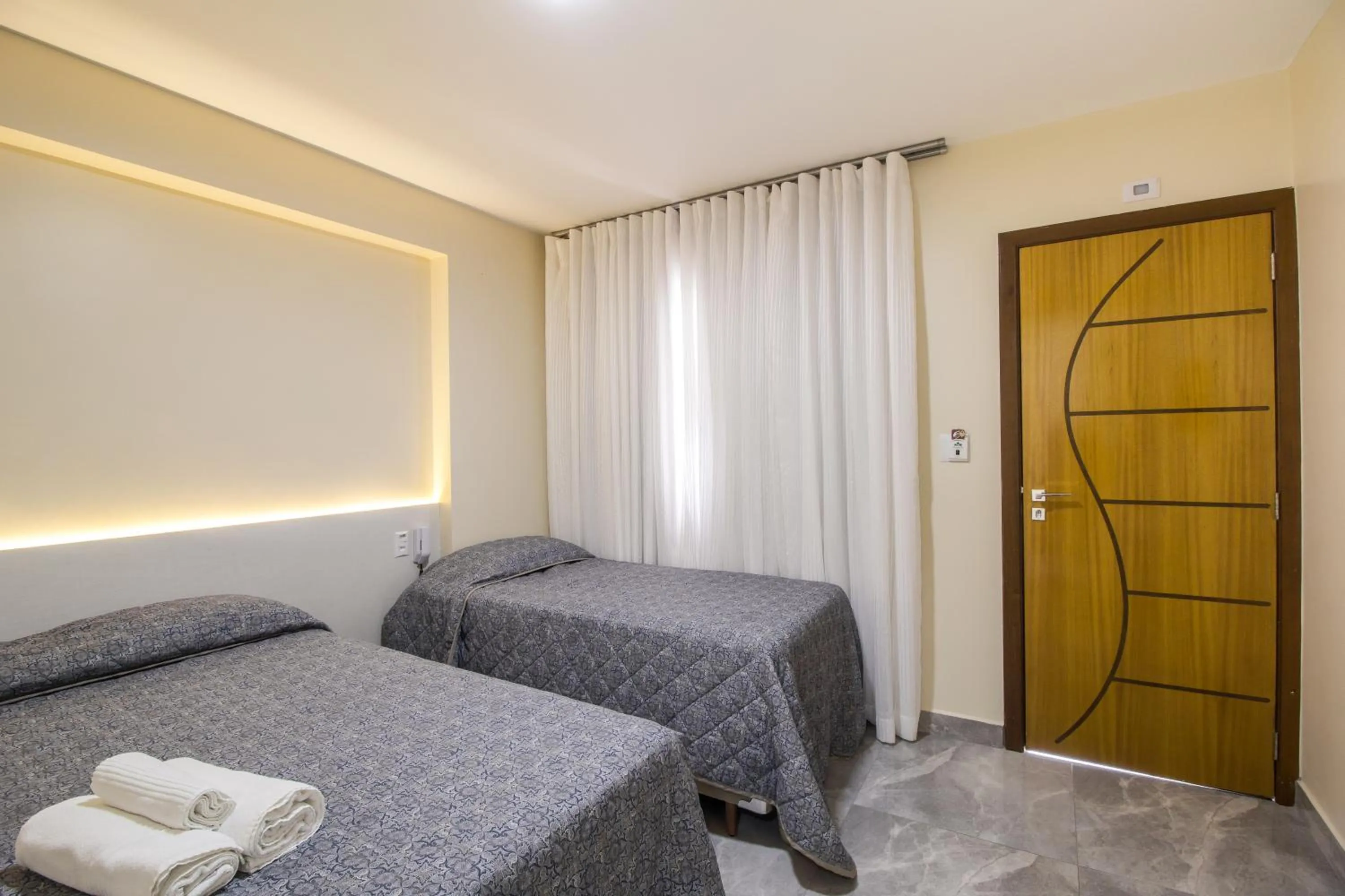 Bed in Pousada Espindola