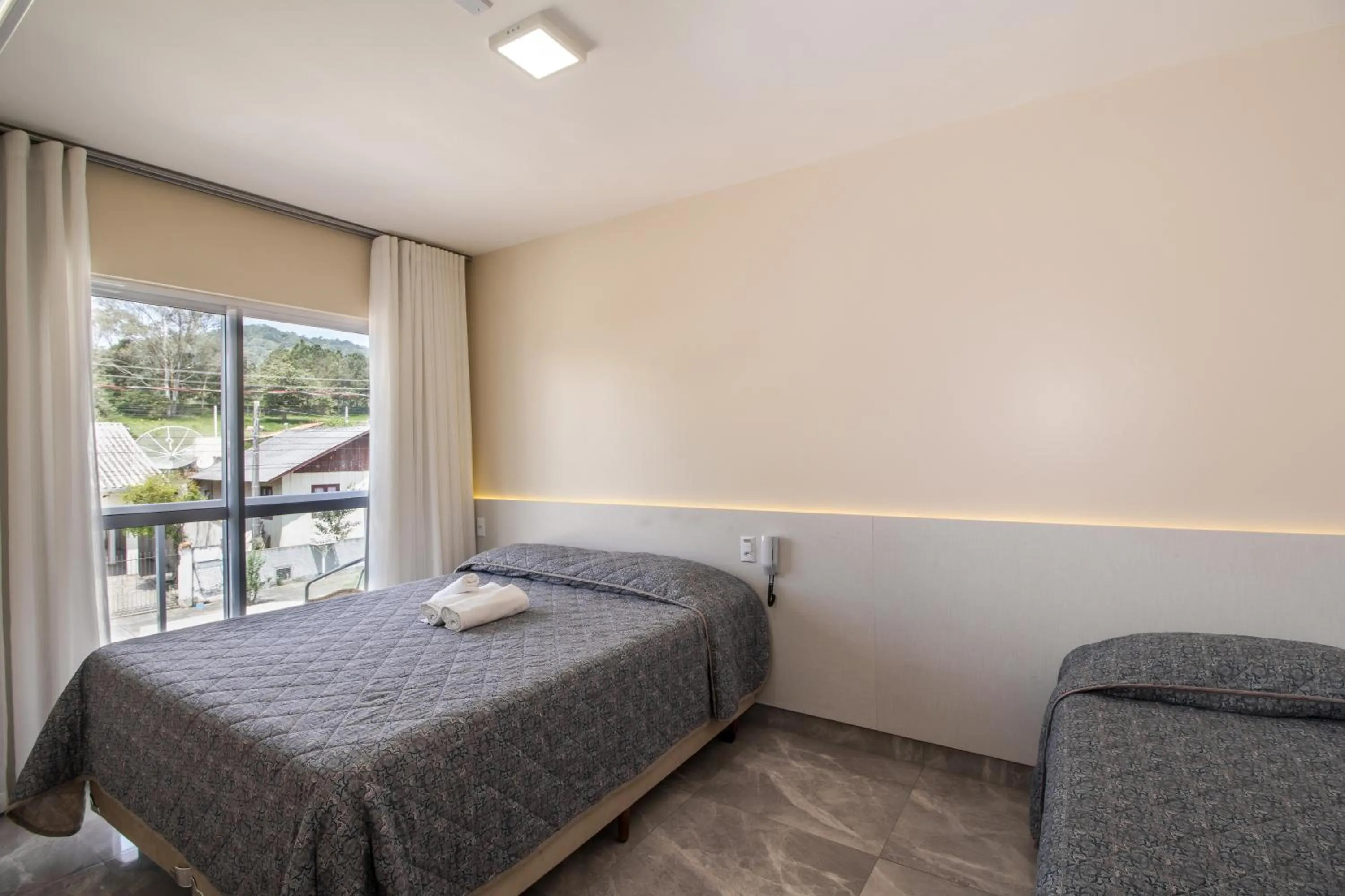 Bed in Pousada Espindola