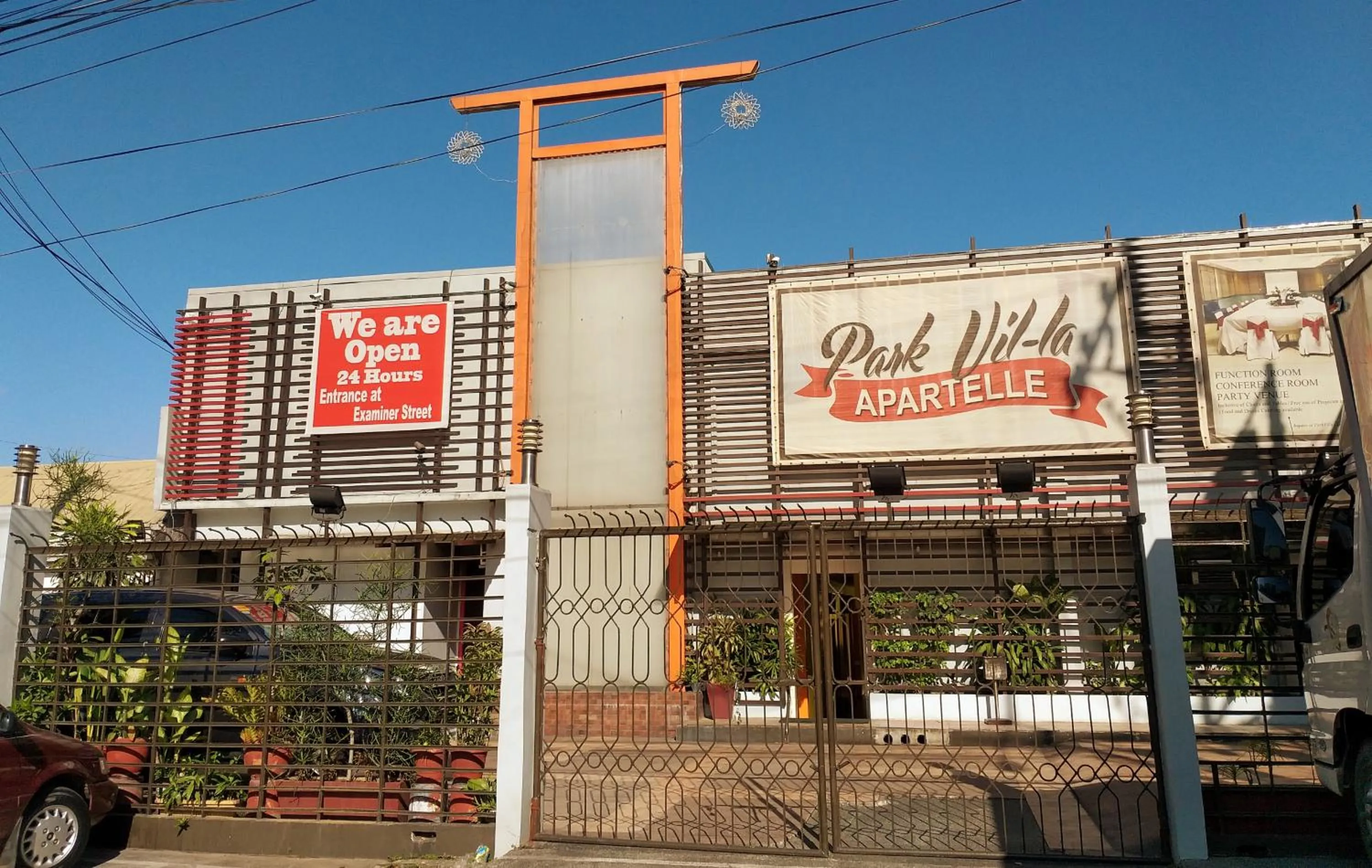 Property logo or sign in Park Vil-la Apartelle