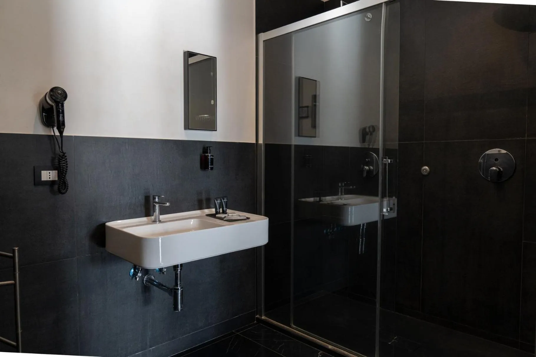 Shower in Secret Garden Resort & Spa