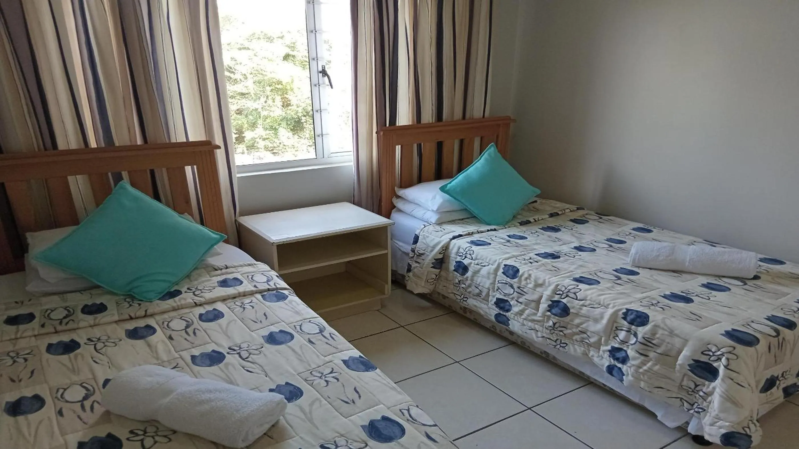 Photo of the whole room, Bed in Sunrise Beach Resort