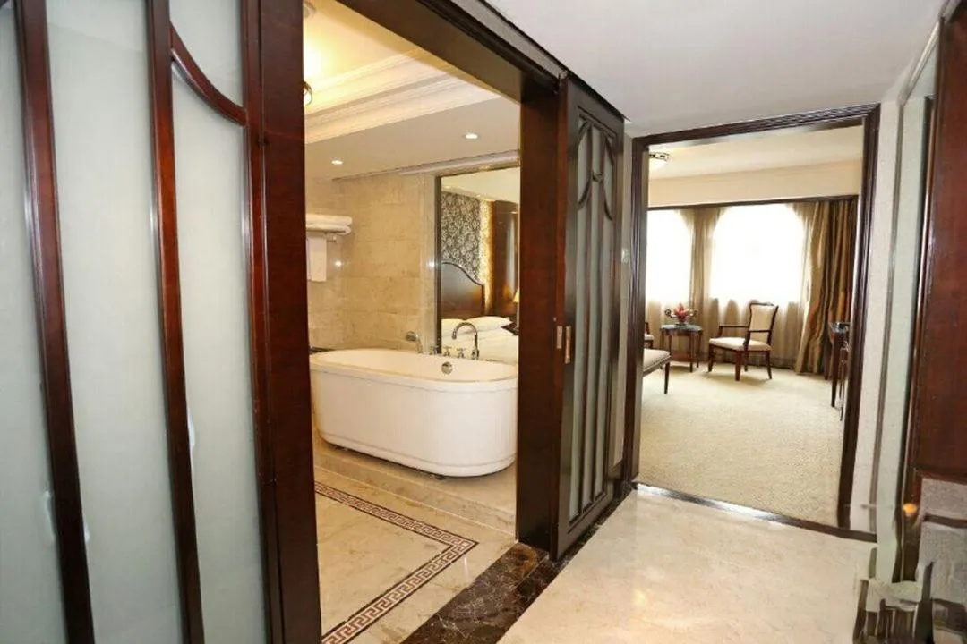 Photo of the whole room in Grand Palace Hotel - Grand Hotel Management Group - Free shuttle bus to Canton Fair during Canton Fair period