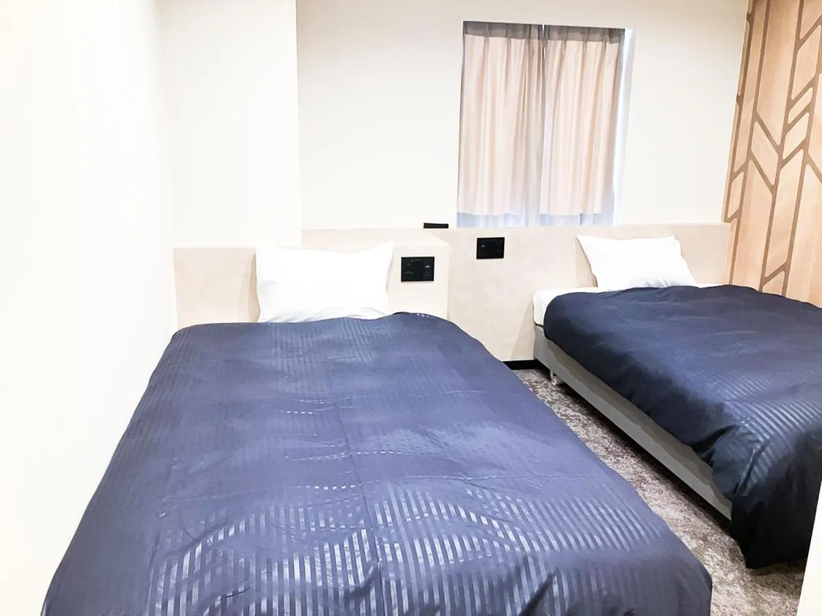 Bed in HOTEL LiVEMAX BUDGET Iyo Mishima