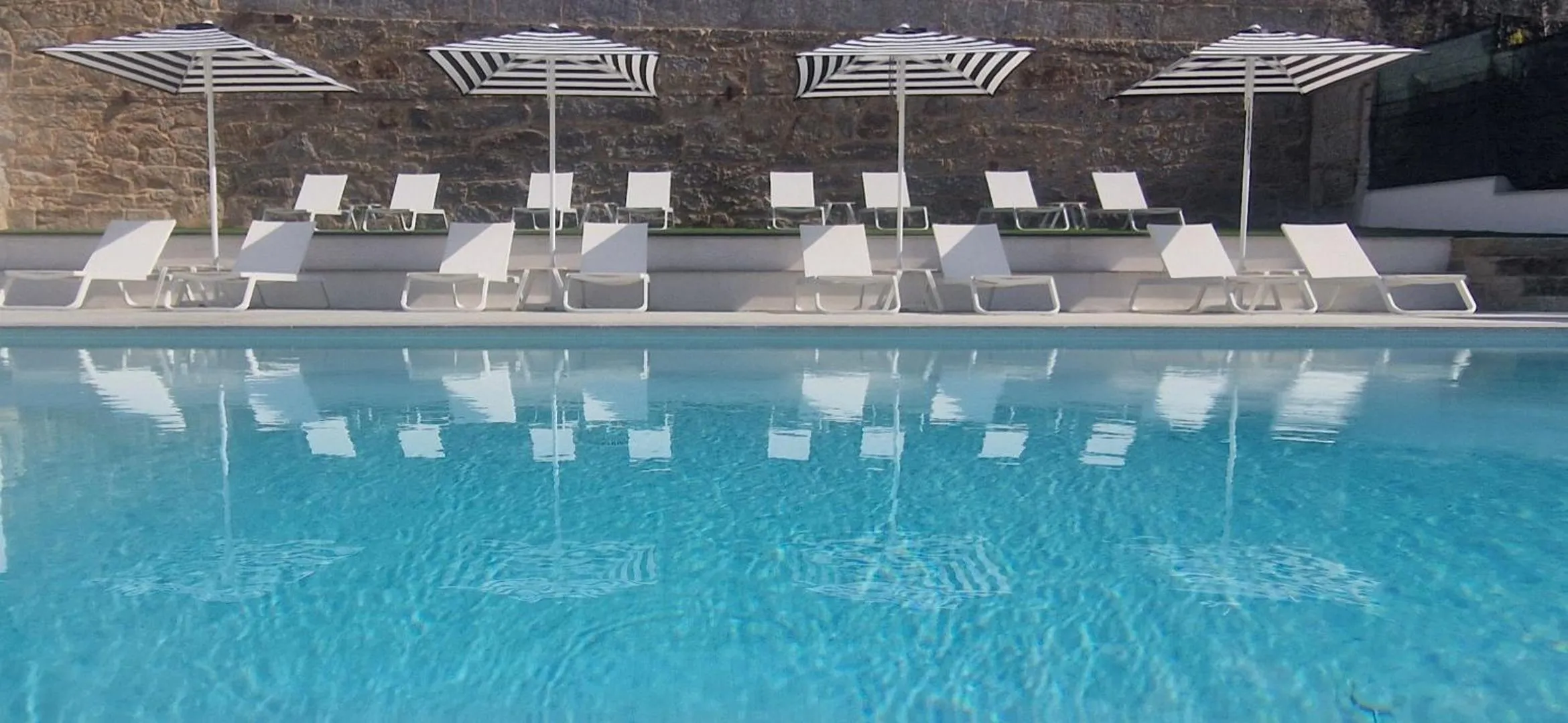 Swimming pool in La Suite Hotel