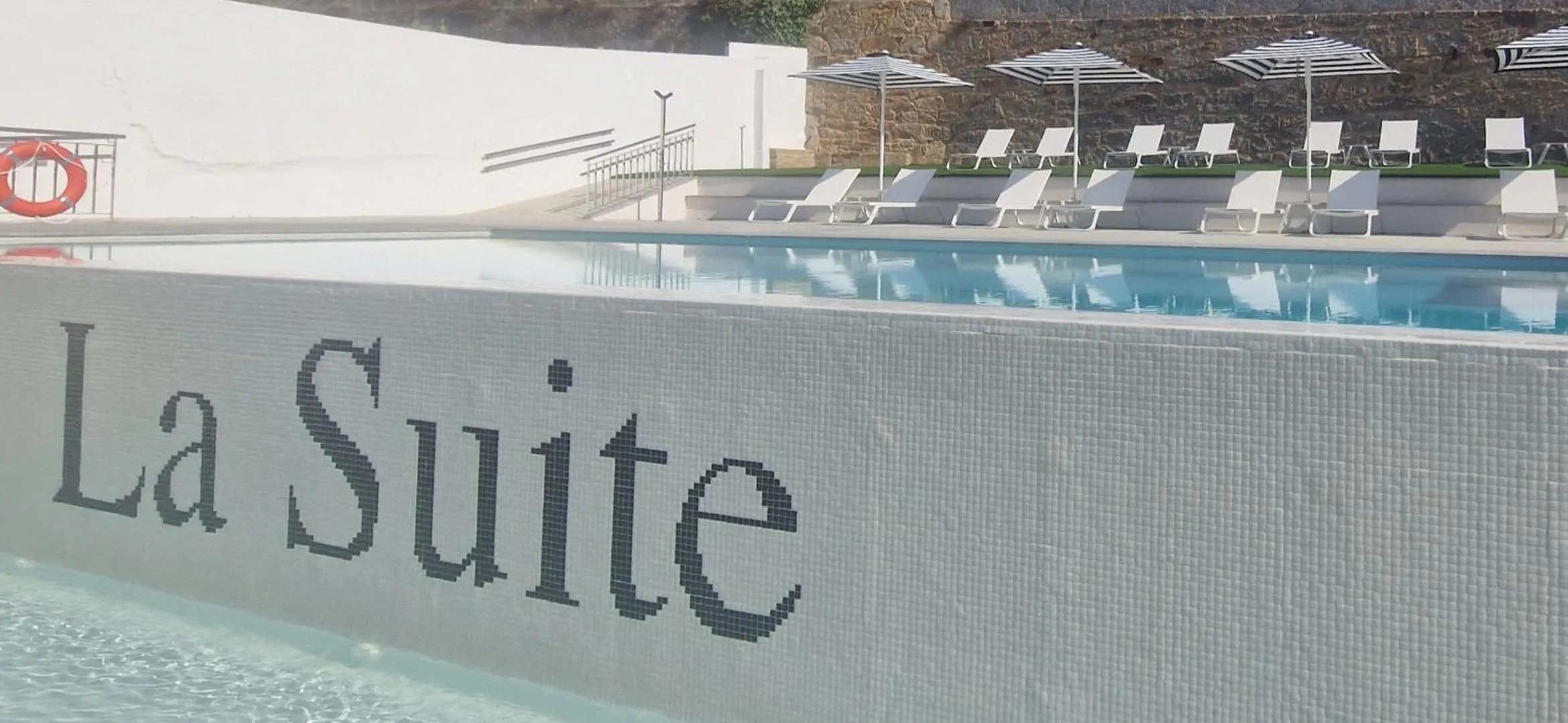 Swimming pool in La Suite Hotel