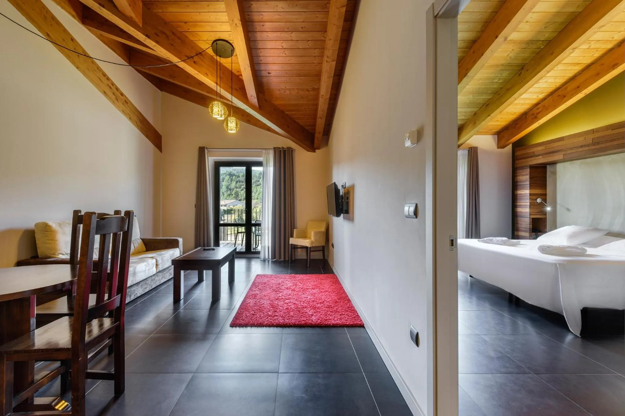 Photo of the whole room, Bed in Hotel Spa Aguas de los Mallos