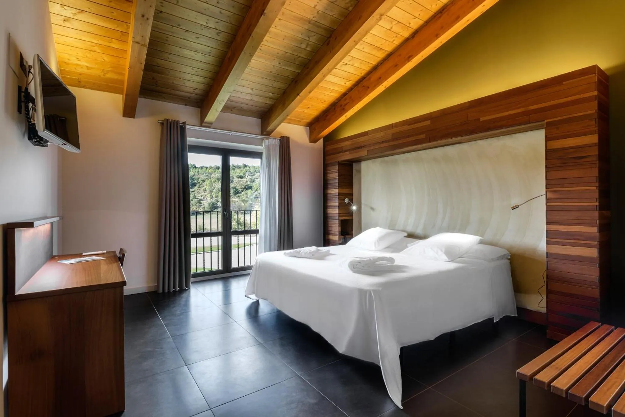 Bed in Hotel Spa Aguas de los Mallos