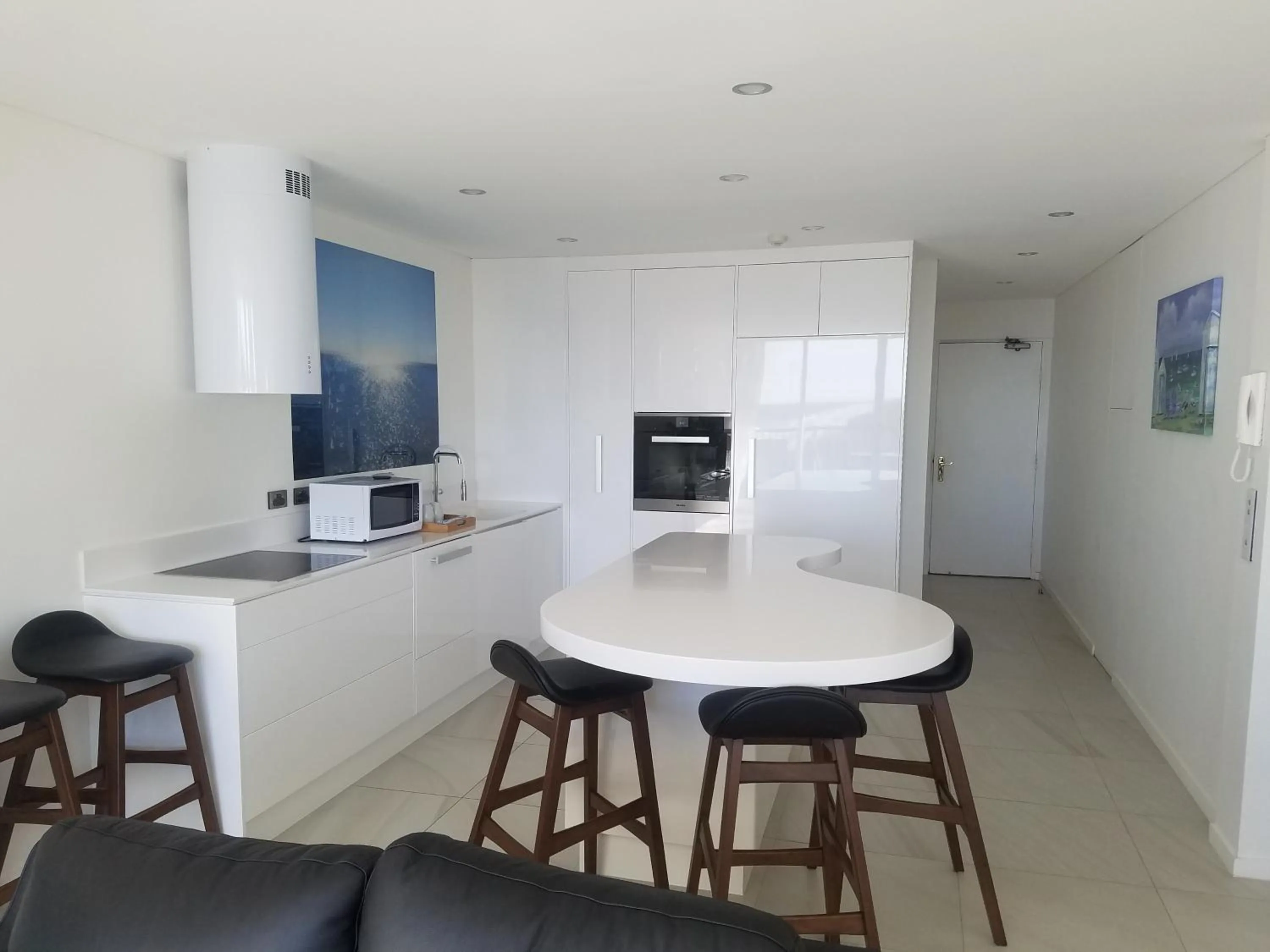 Kitchen or kitchenette in Golden Sands on the Beach - Absolute Beachfront Apartments