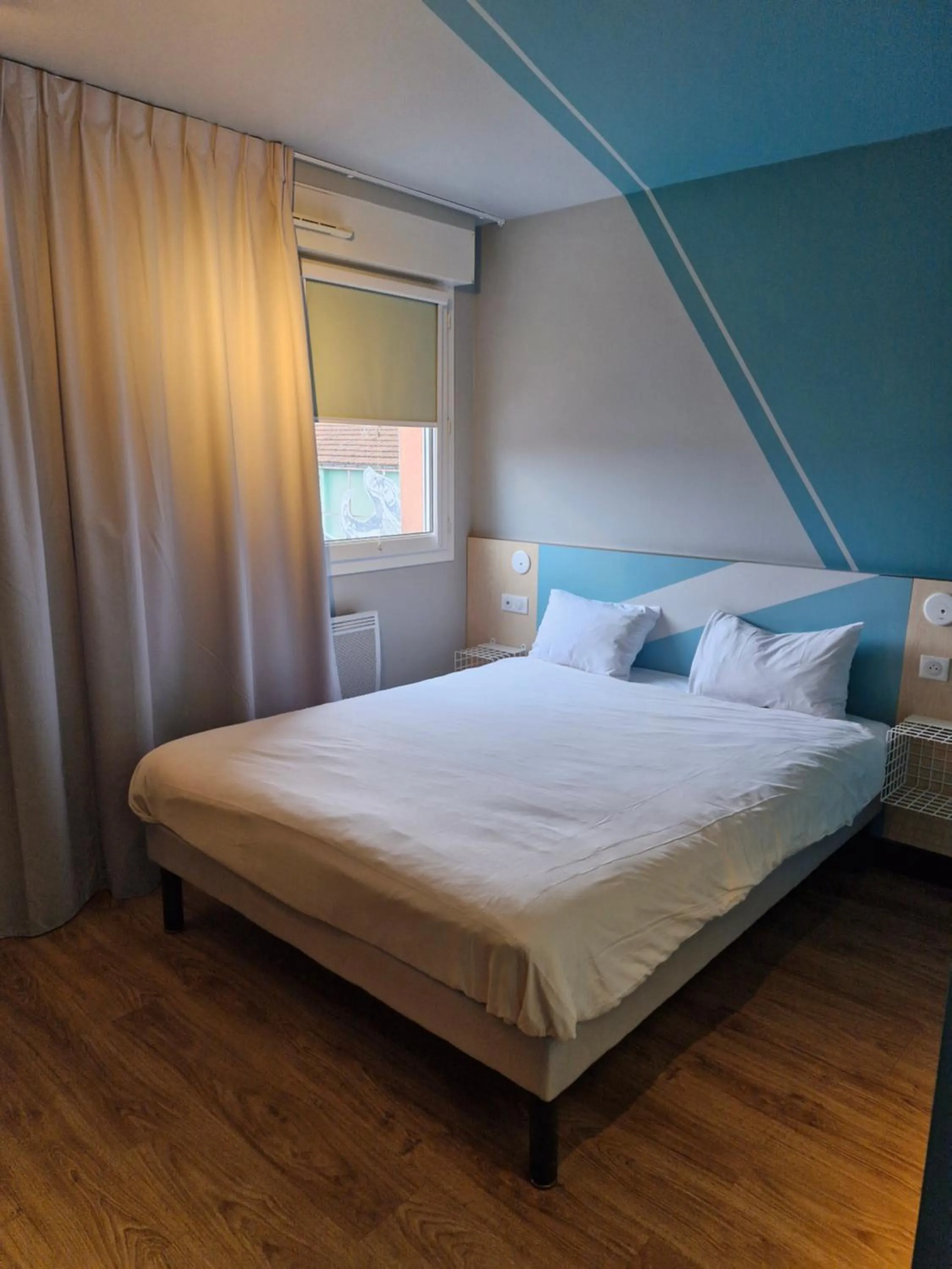 Bed in ibis budget Saint Dié des Vosges