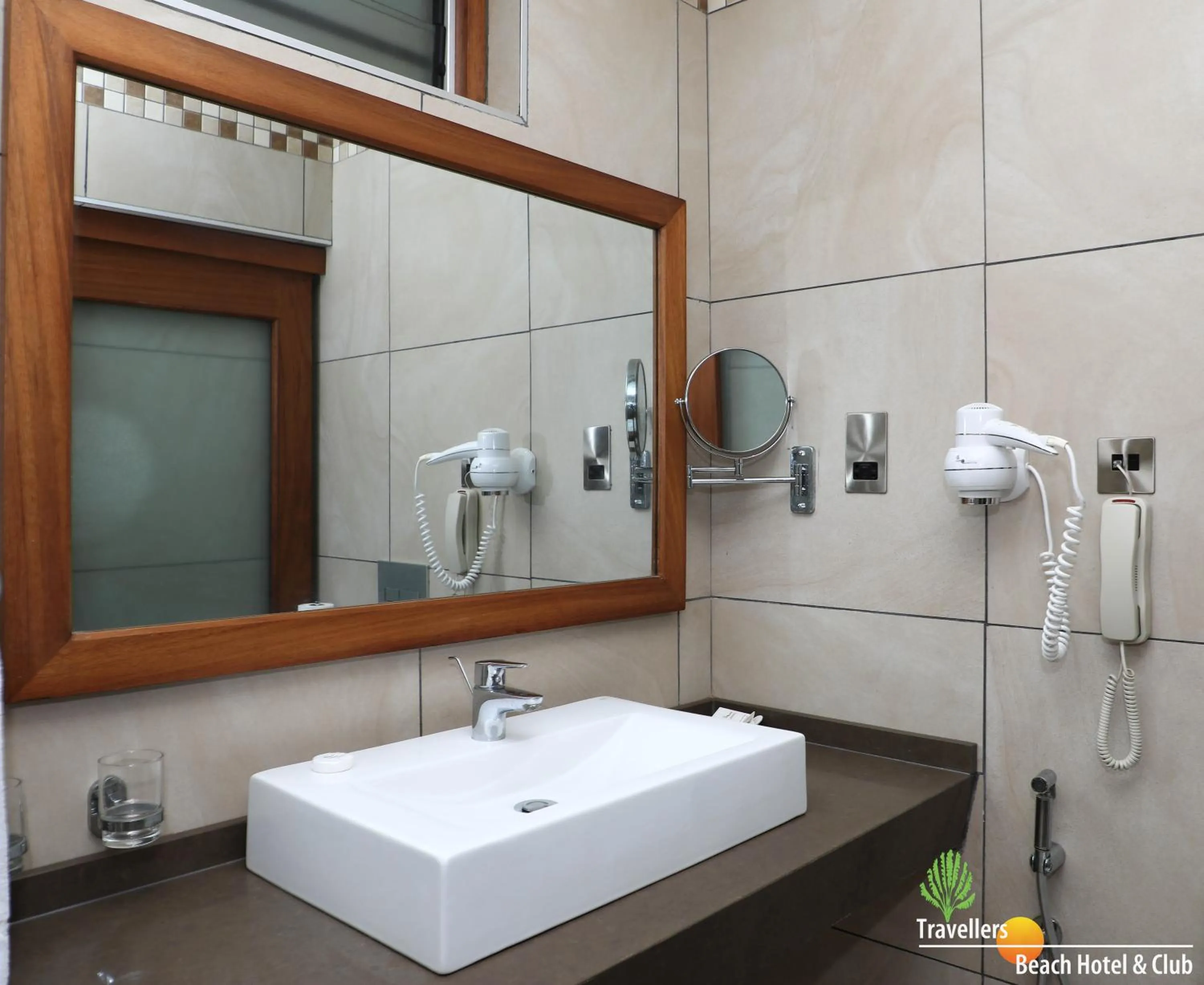 Bathroom in Travellers Beach Hotel & SPA