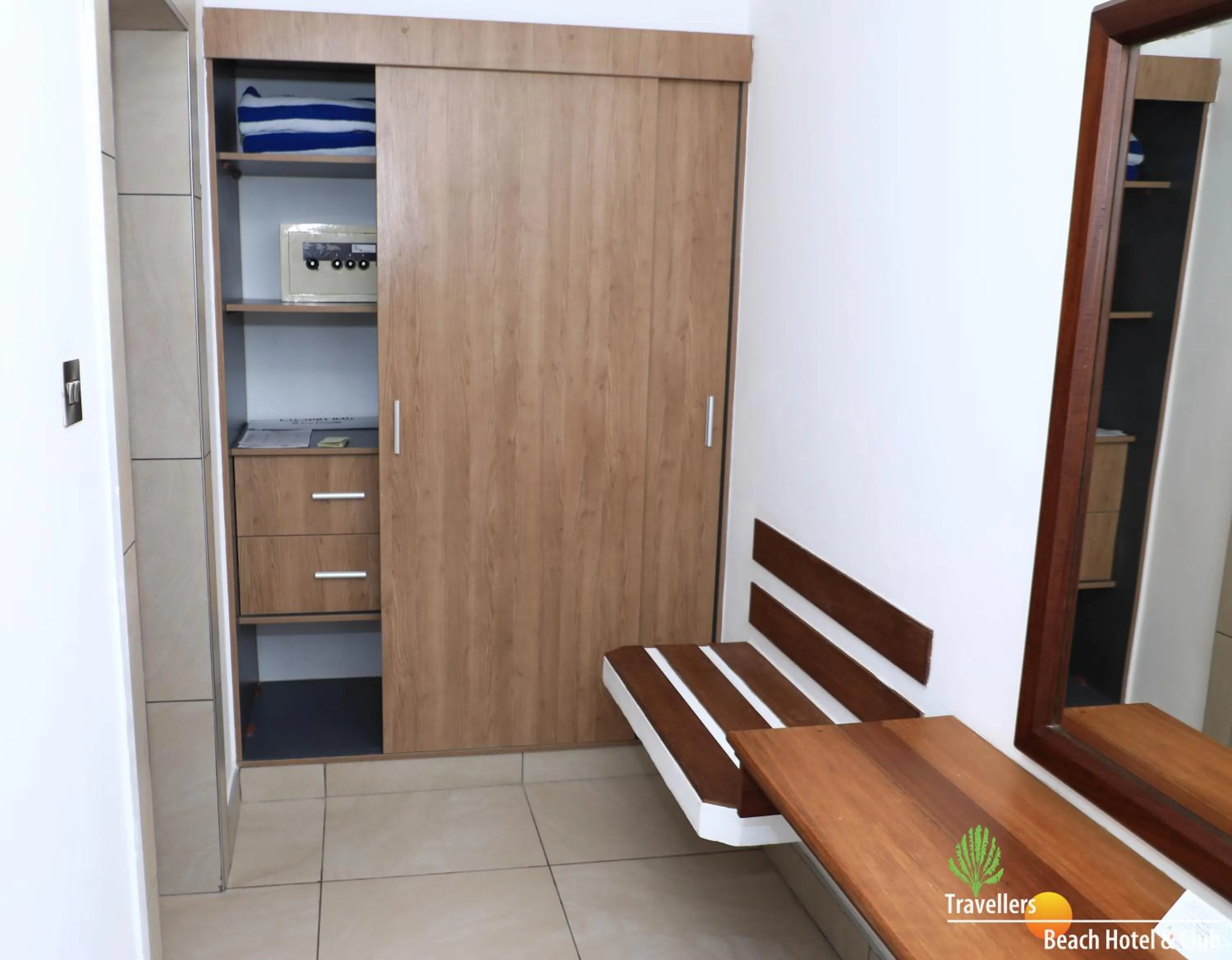 wardrobe in Travellers Beach Hotel & SPA