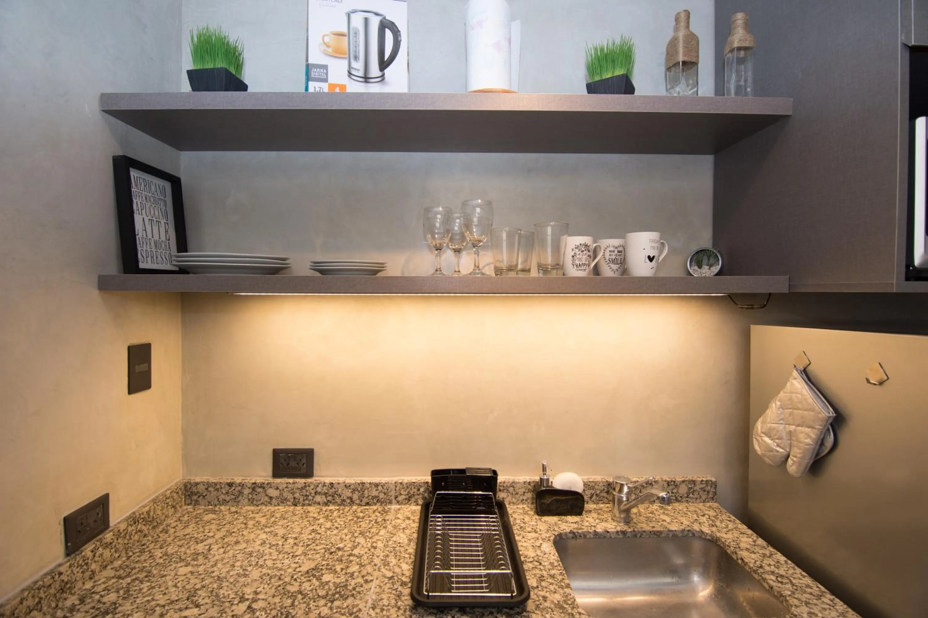 Kitchen or kitchenette in Soho Rentals