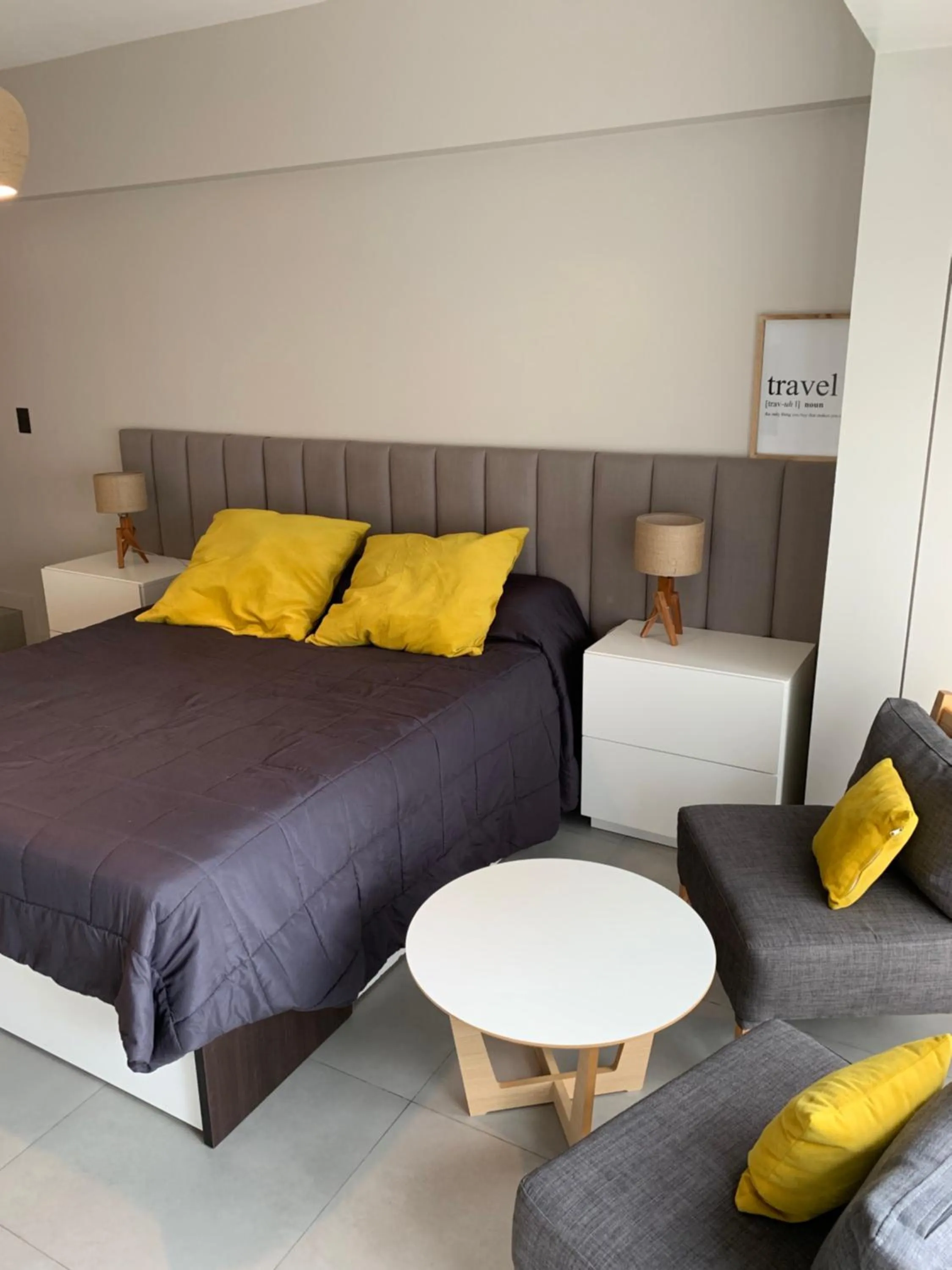 Seating area, Bed in Soho Rentals