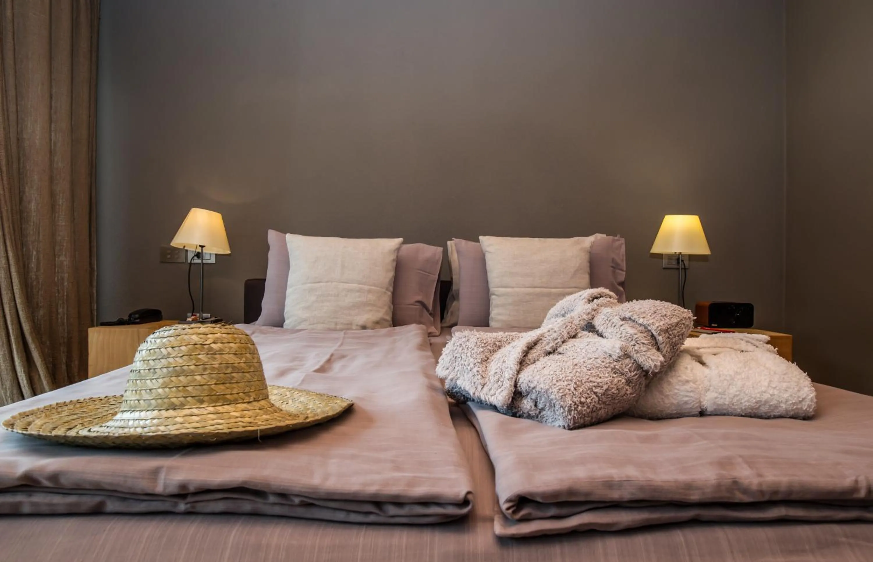 Bed in Vivere Suites & Rooms