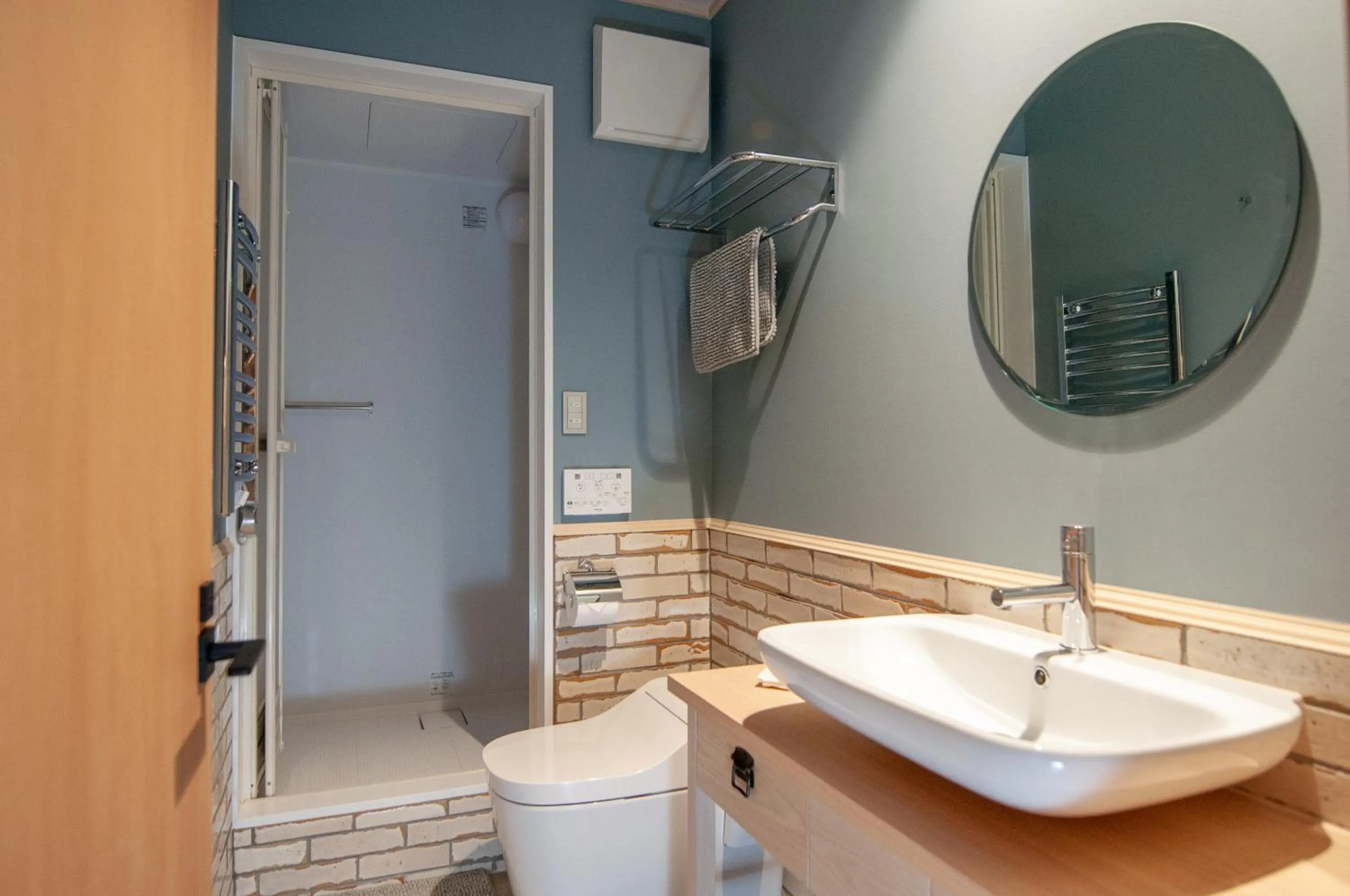 Bathroom in Wadano Gateway Suites & Apartments