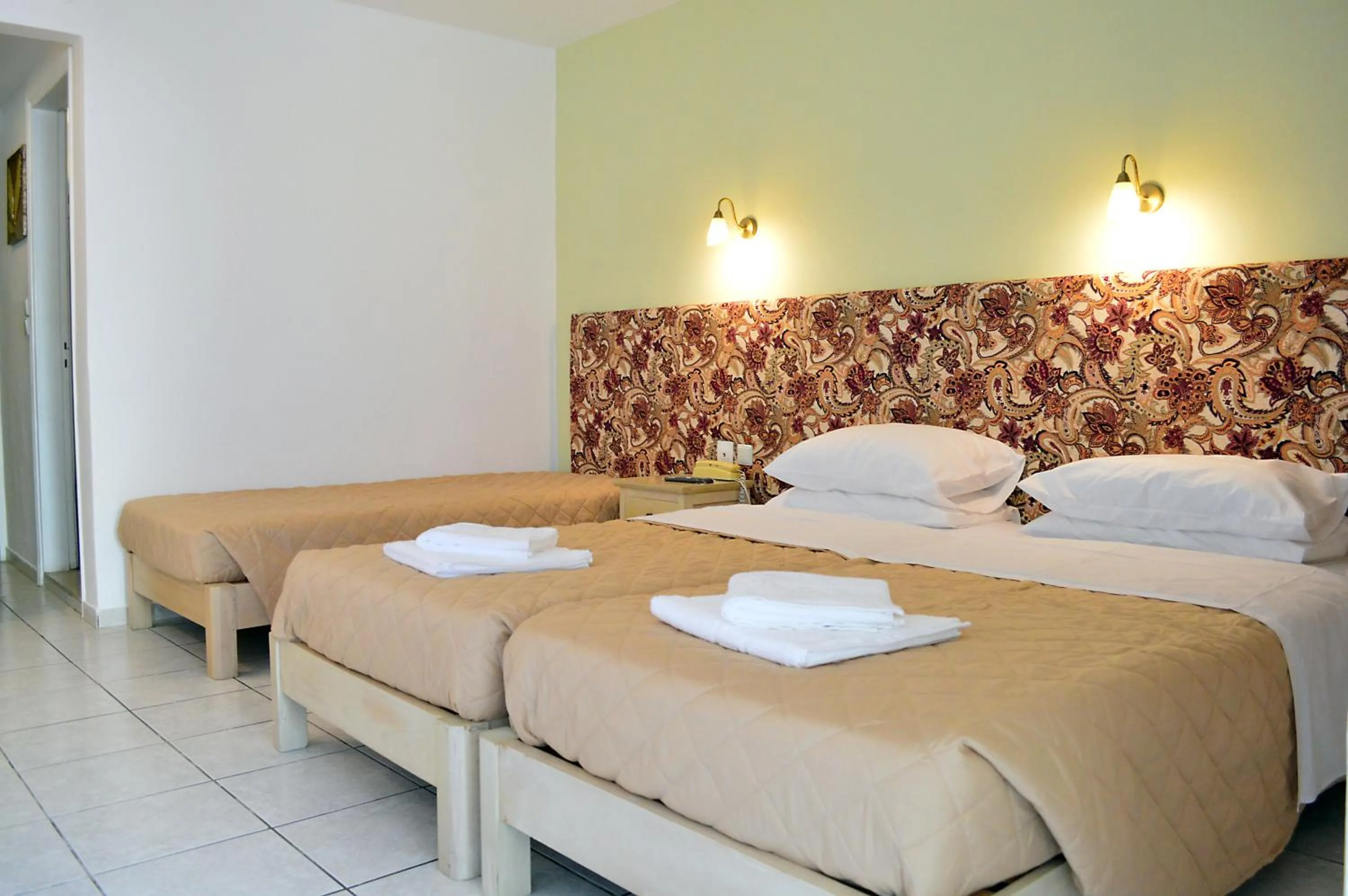 Bed in Alexandros Hotel