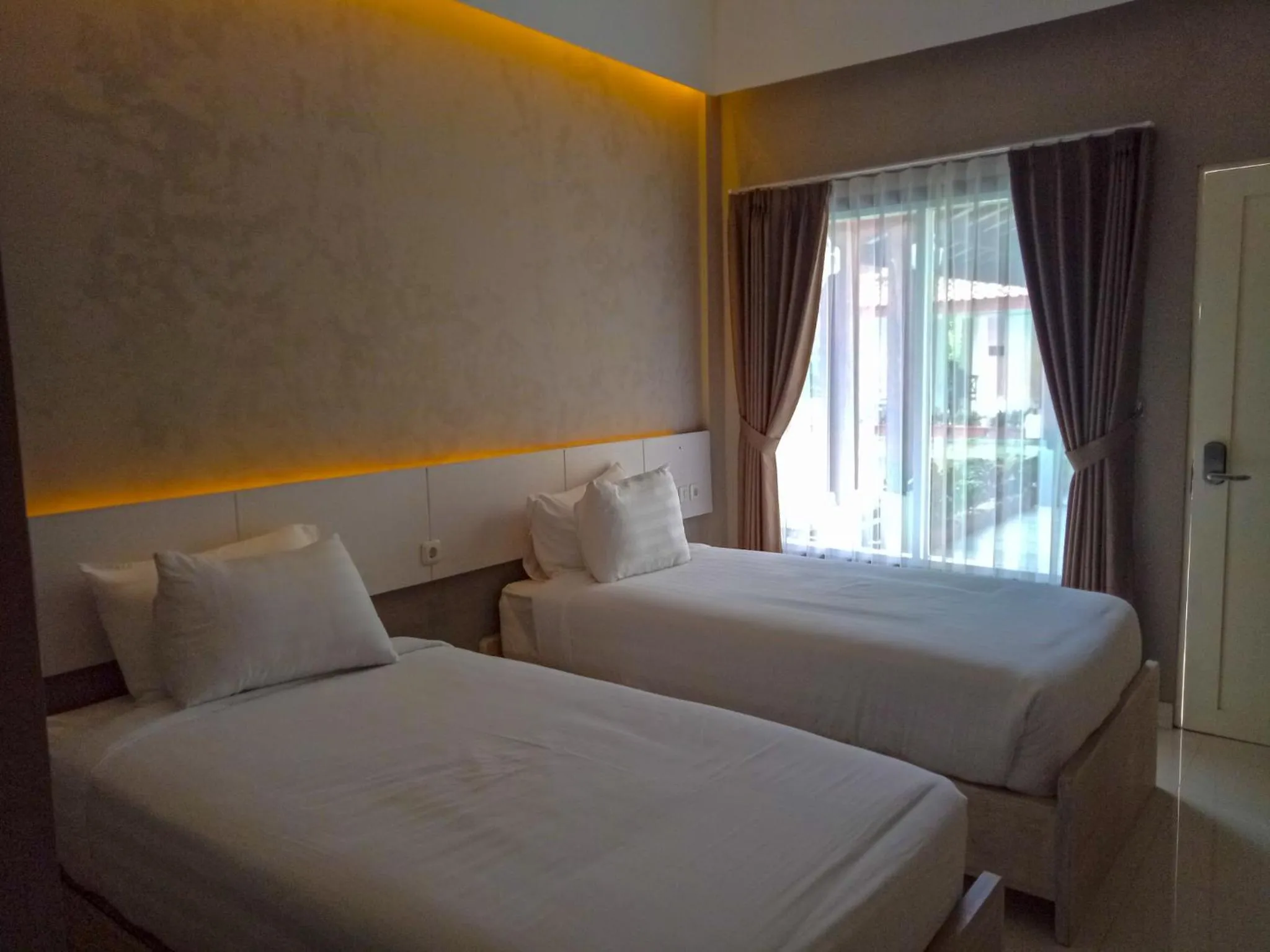 Bed in Sinom Borobudur Heritage Hotel