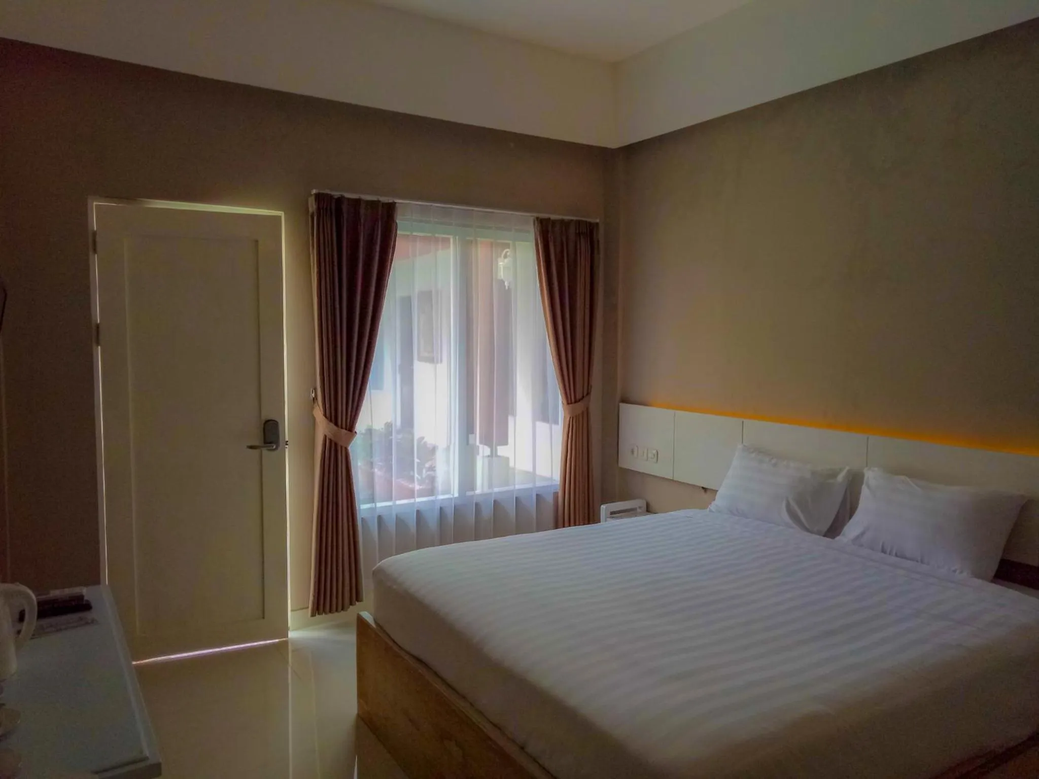 Bed in Sinom Borobudur Heritage Hotel