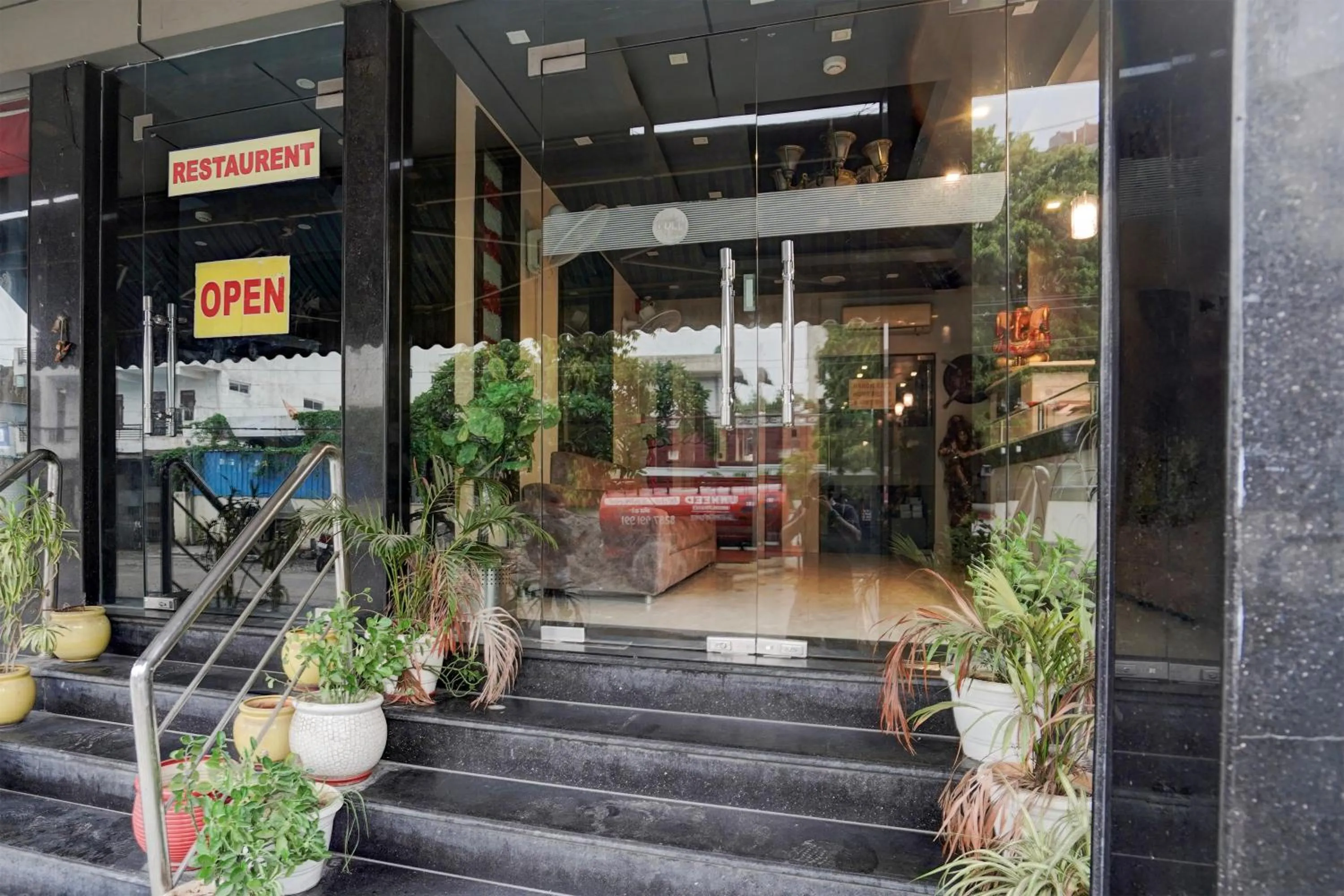 Facade/entrance in Super Townhouse Bani Park Formerly Aroma Residency