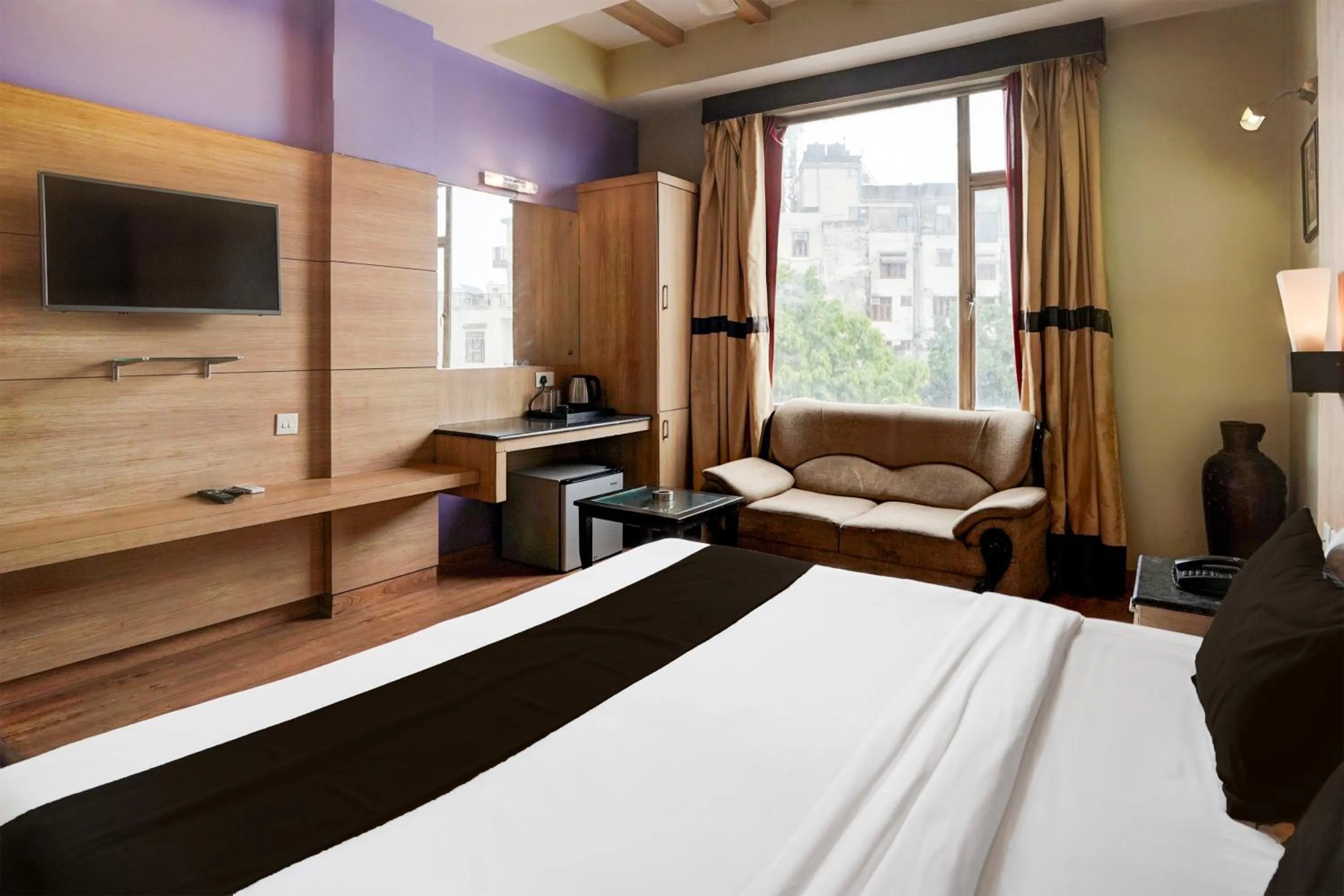 Bedroom, Bed in Super Townhouse Bani Park Formerly Aroma Residency