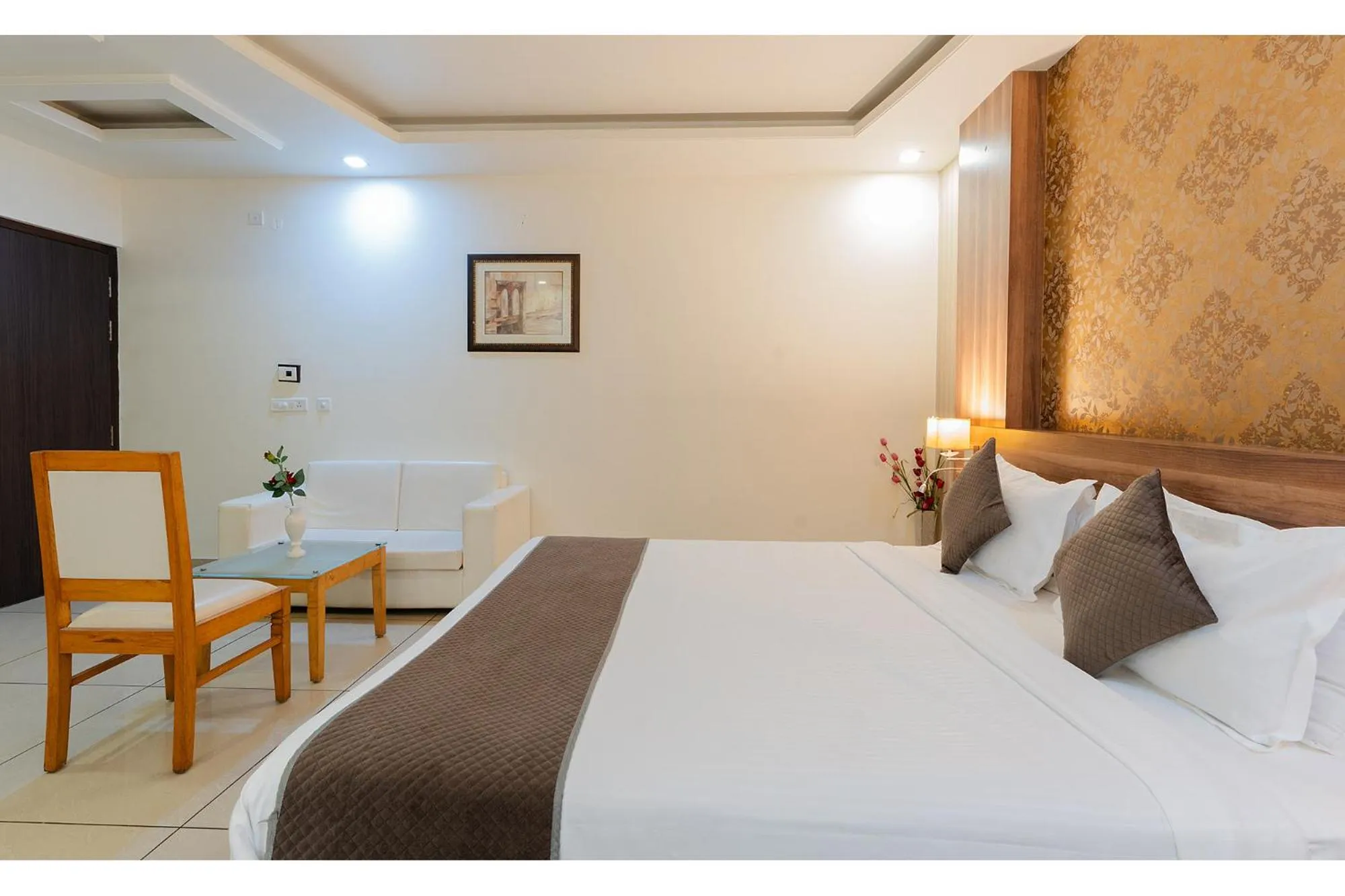 Bed in FabHotel Signature Inn