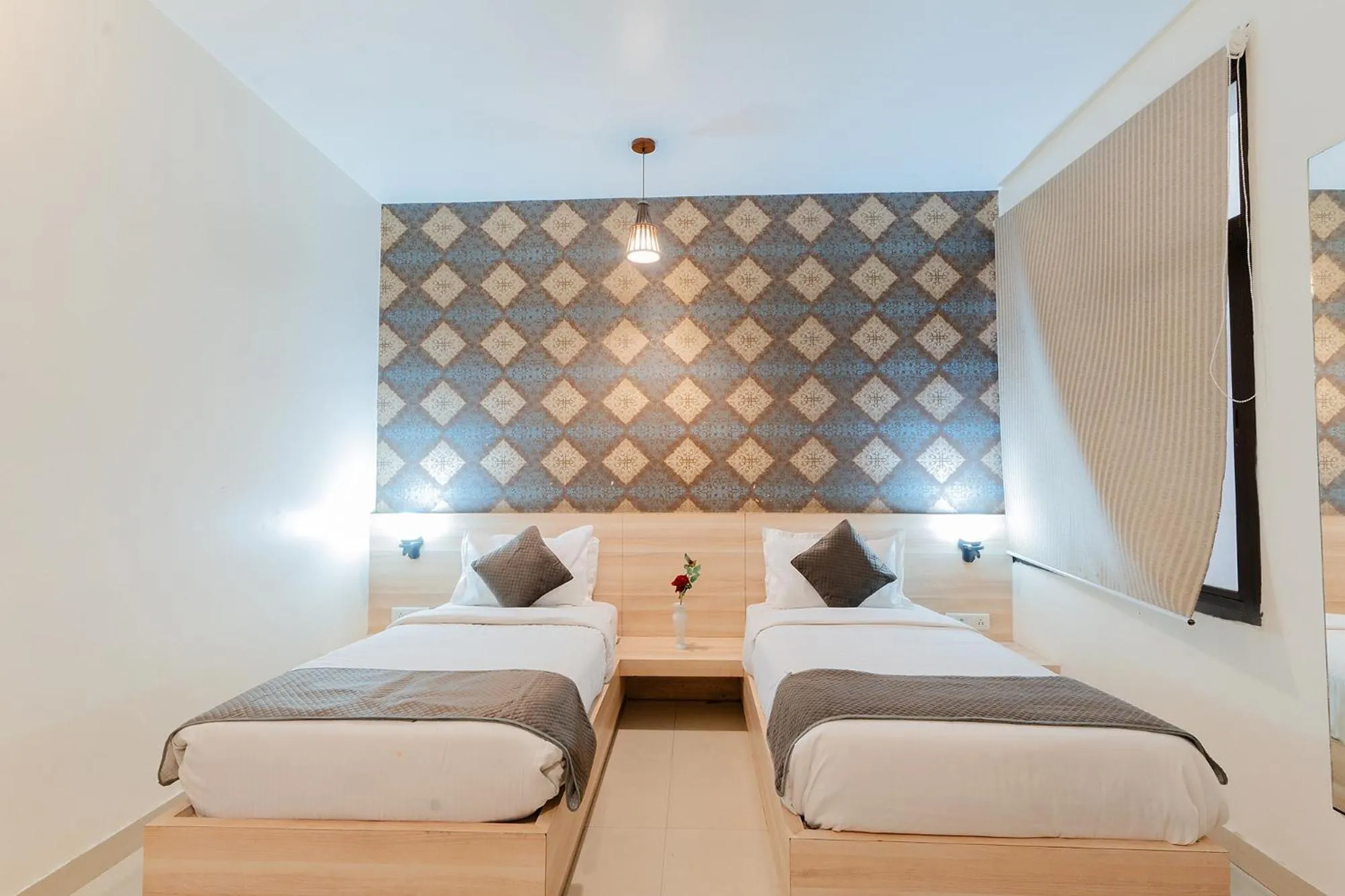 Bed in FabHotel Signature Inn