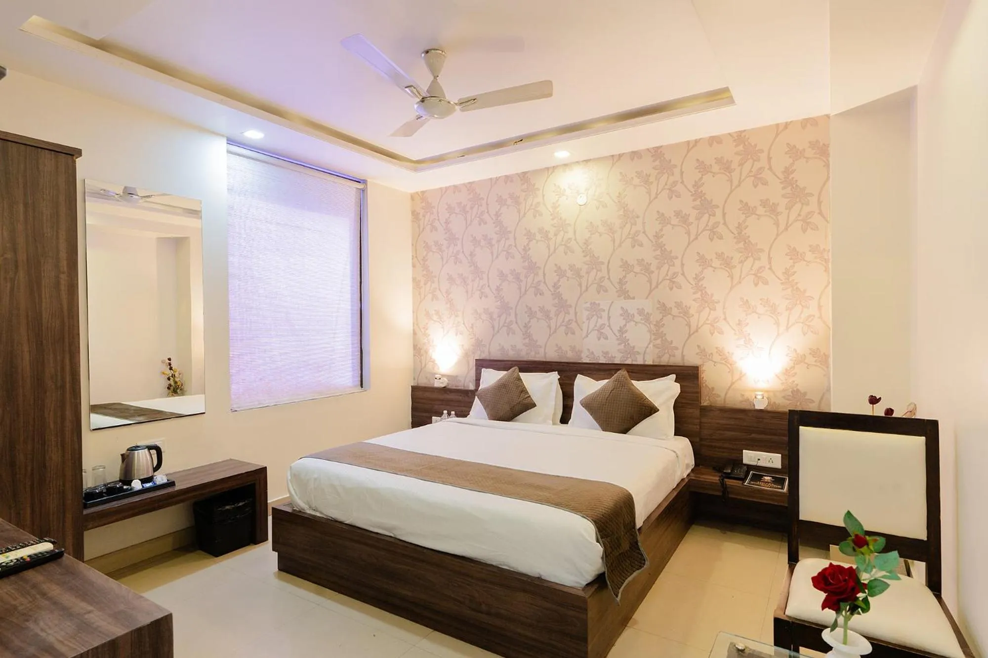 Bed in FabHotel Signature Inn