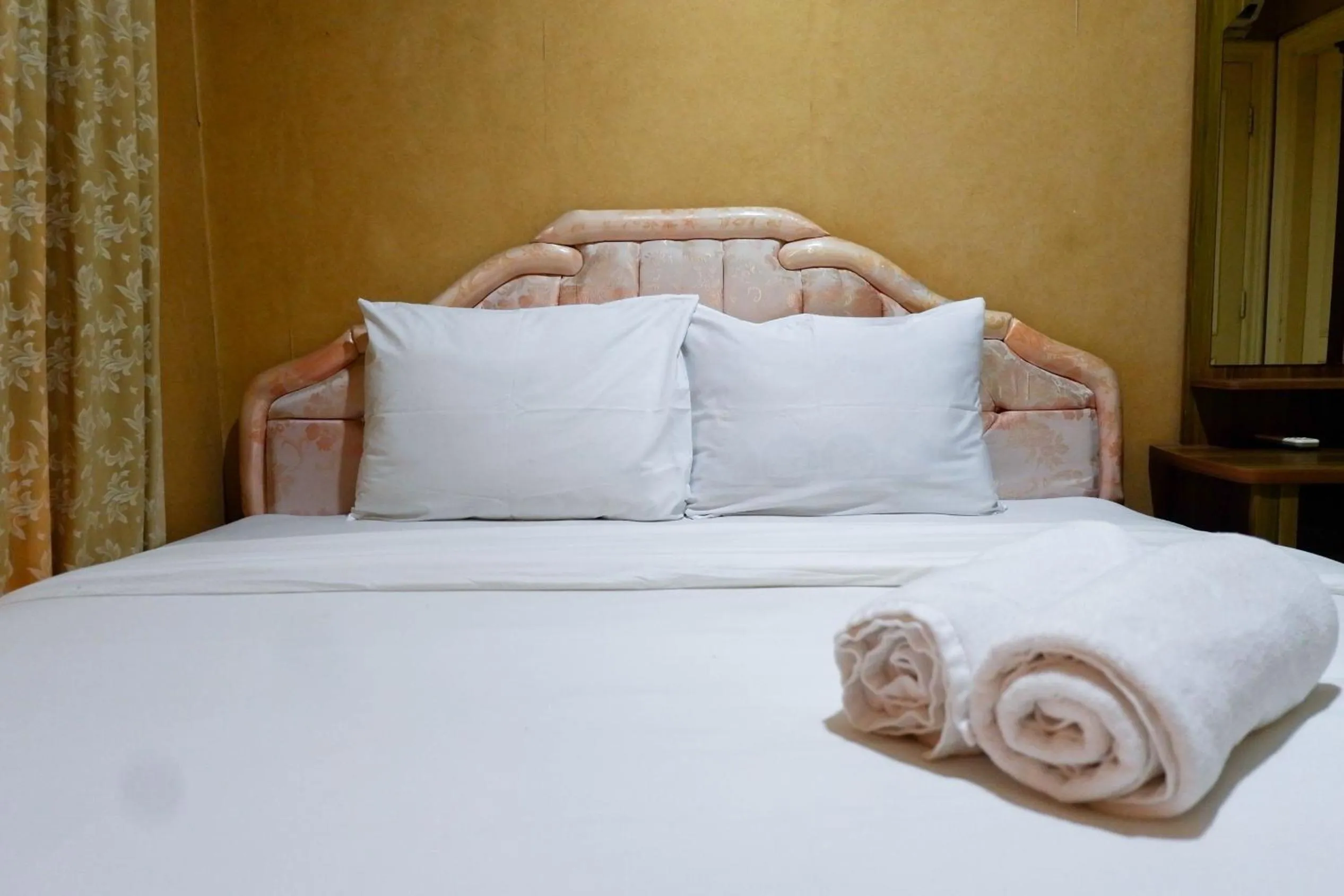 Bed in Spacious 1BR Apartment at Taman Beverly By Travelio