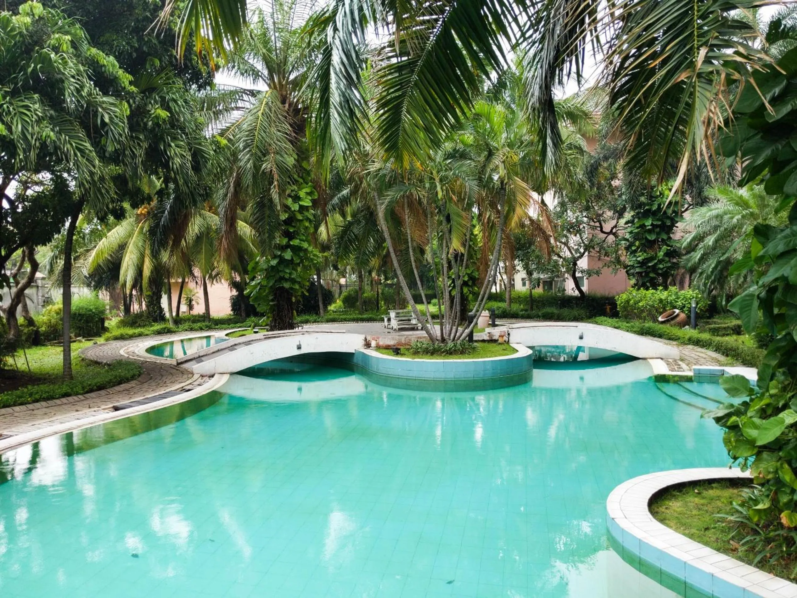 Swimming pool in Spacious 1BR Apartment at Taman Beverly By Travelio