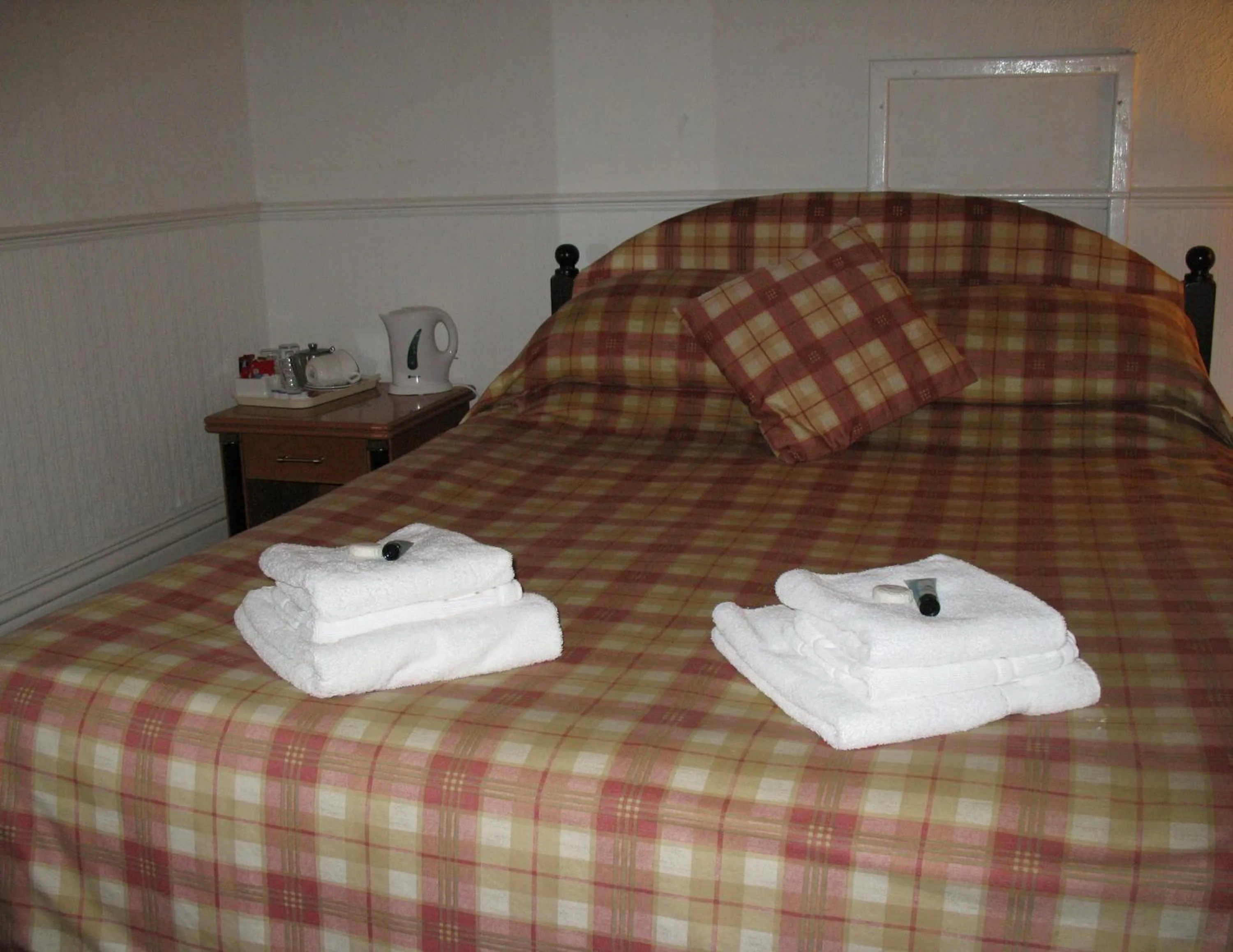 Bed in Michaelson House Hotel