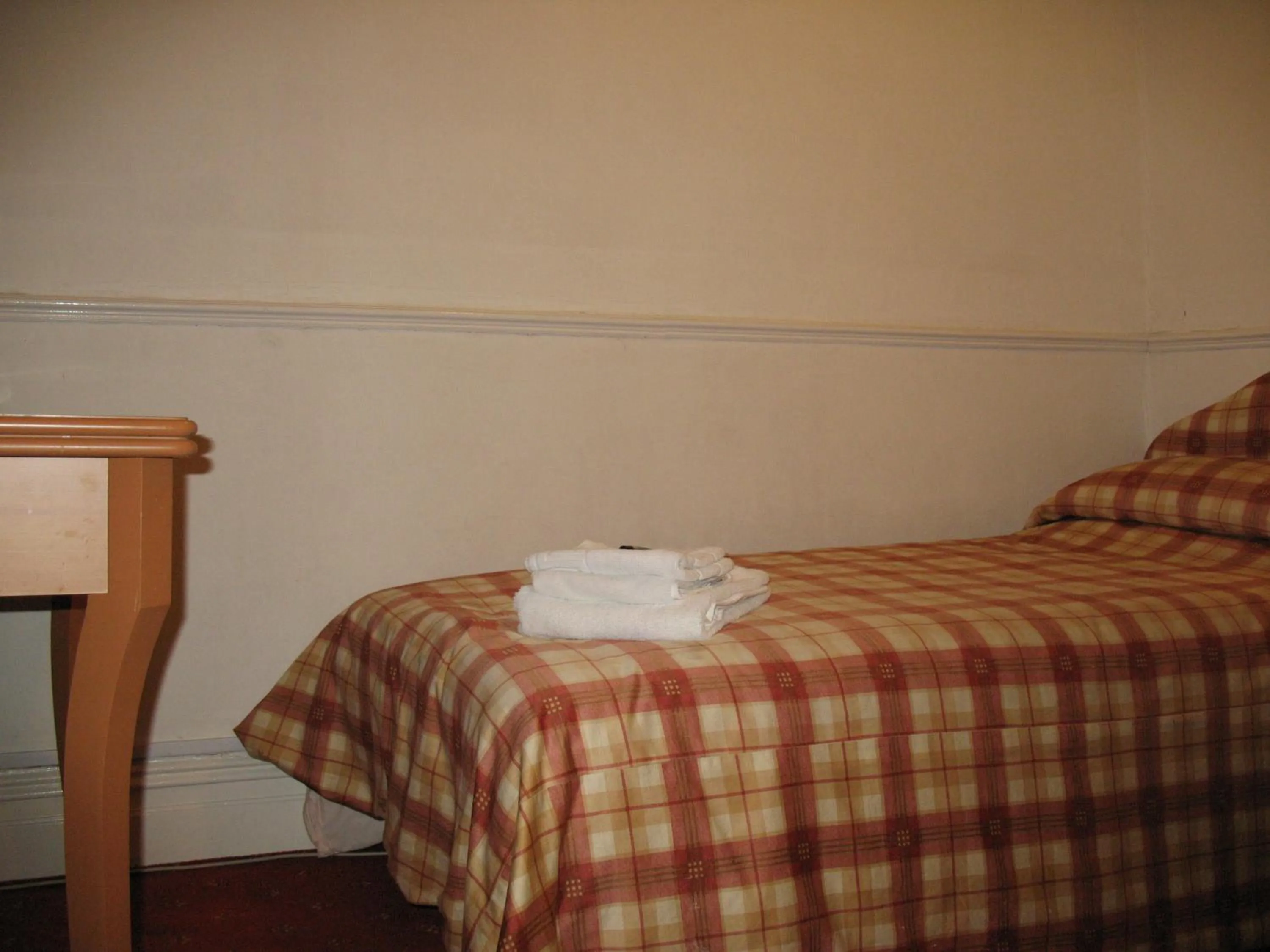 Bed in Michaelson House Hotel