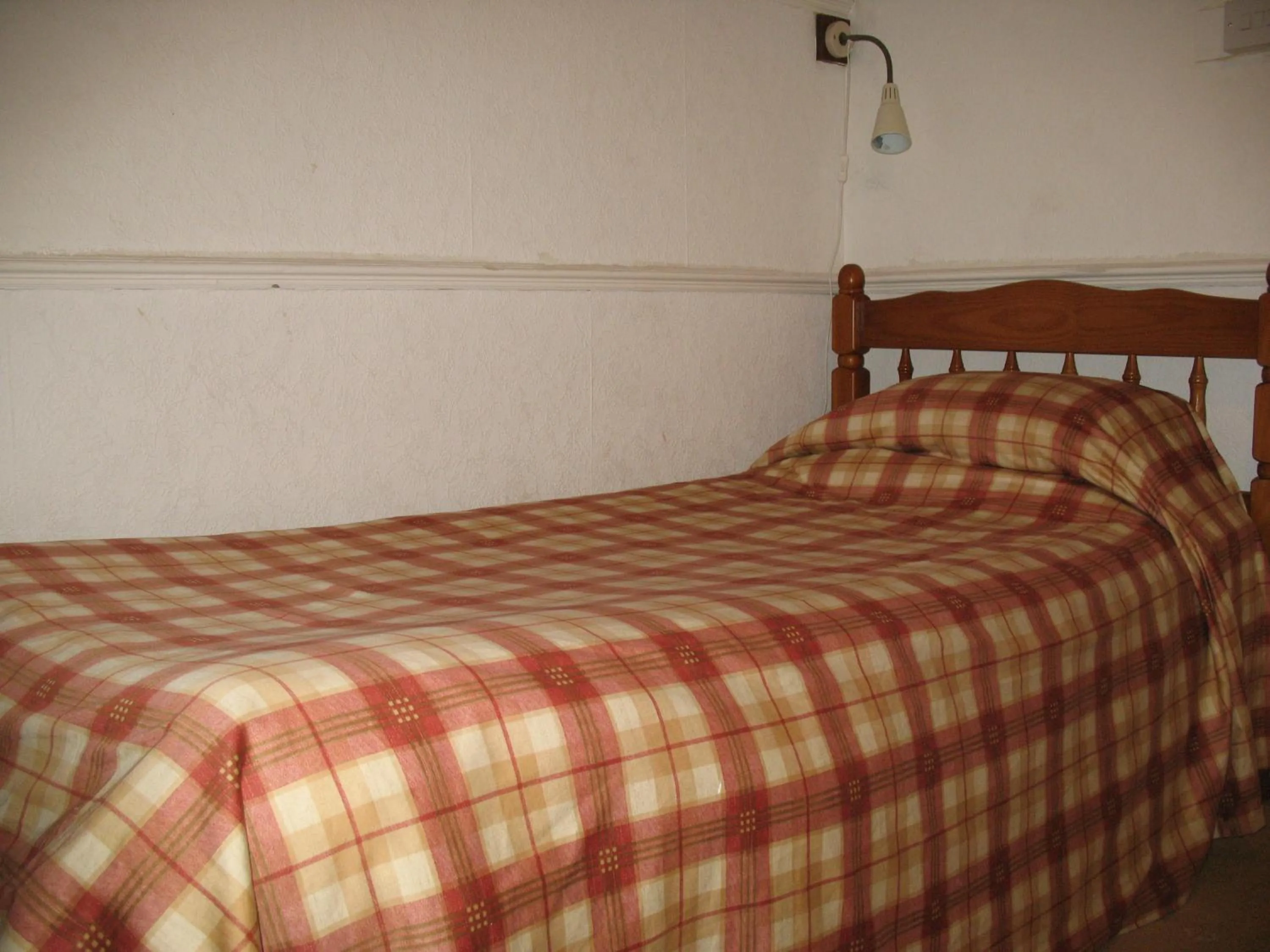 Bed in Michaelson House Hotel