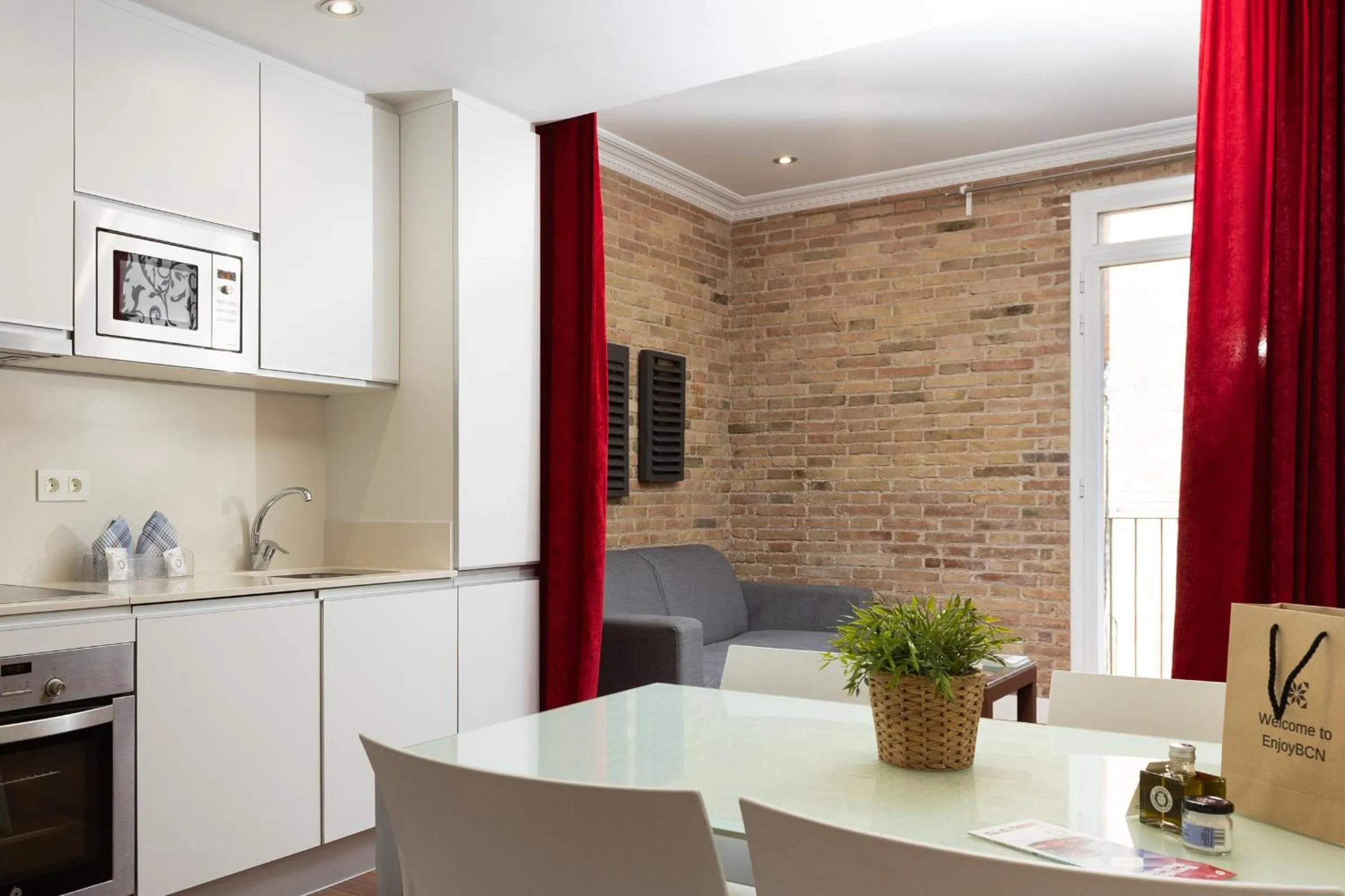 Kitchen or kitchenette in Enjoybcn Gaudi Apartments