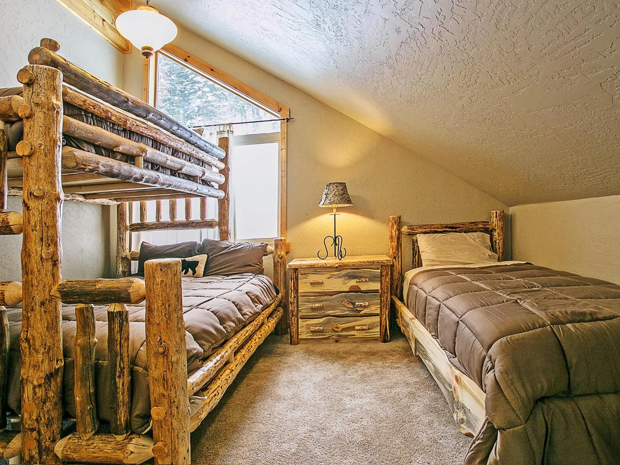 Bed in Spacious Sandpoint Chalet with Hot Tub Views