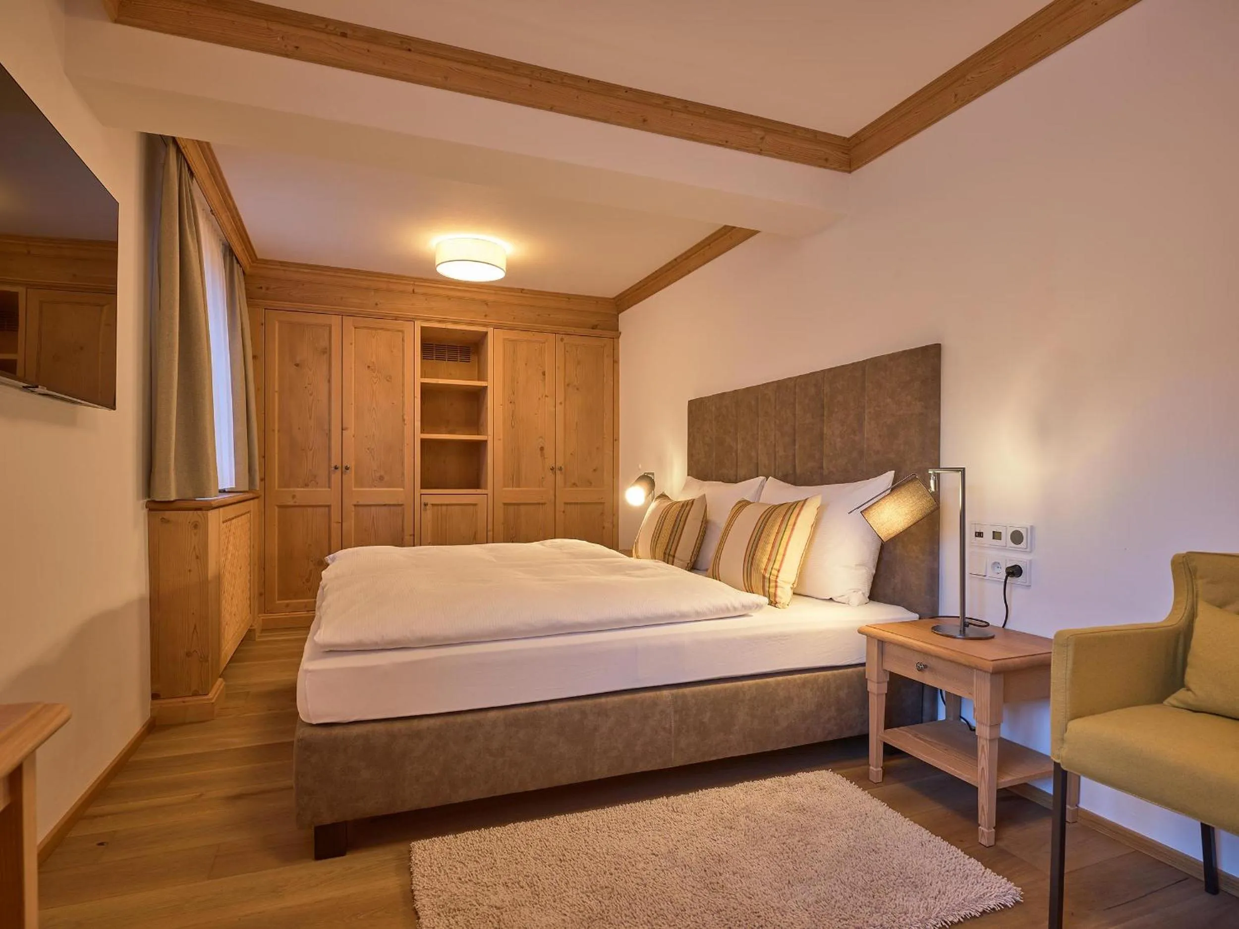 Bedroom in Hotel Garni Albona