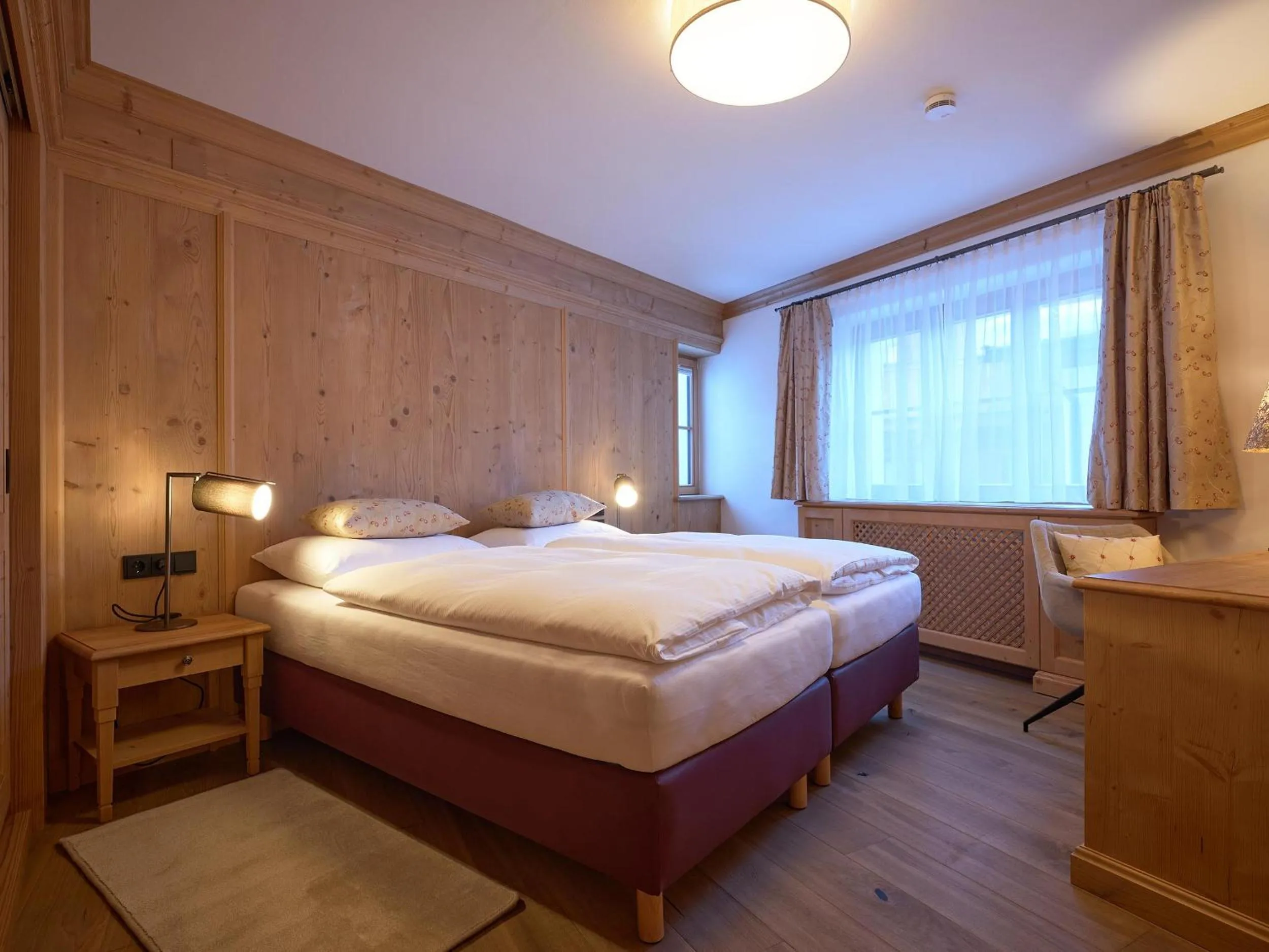 Bedroom in Hotel Garni Albona